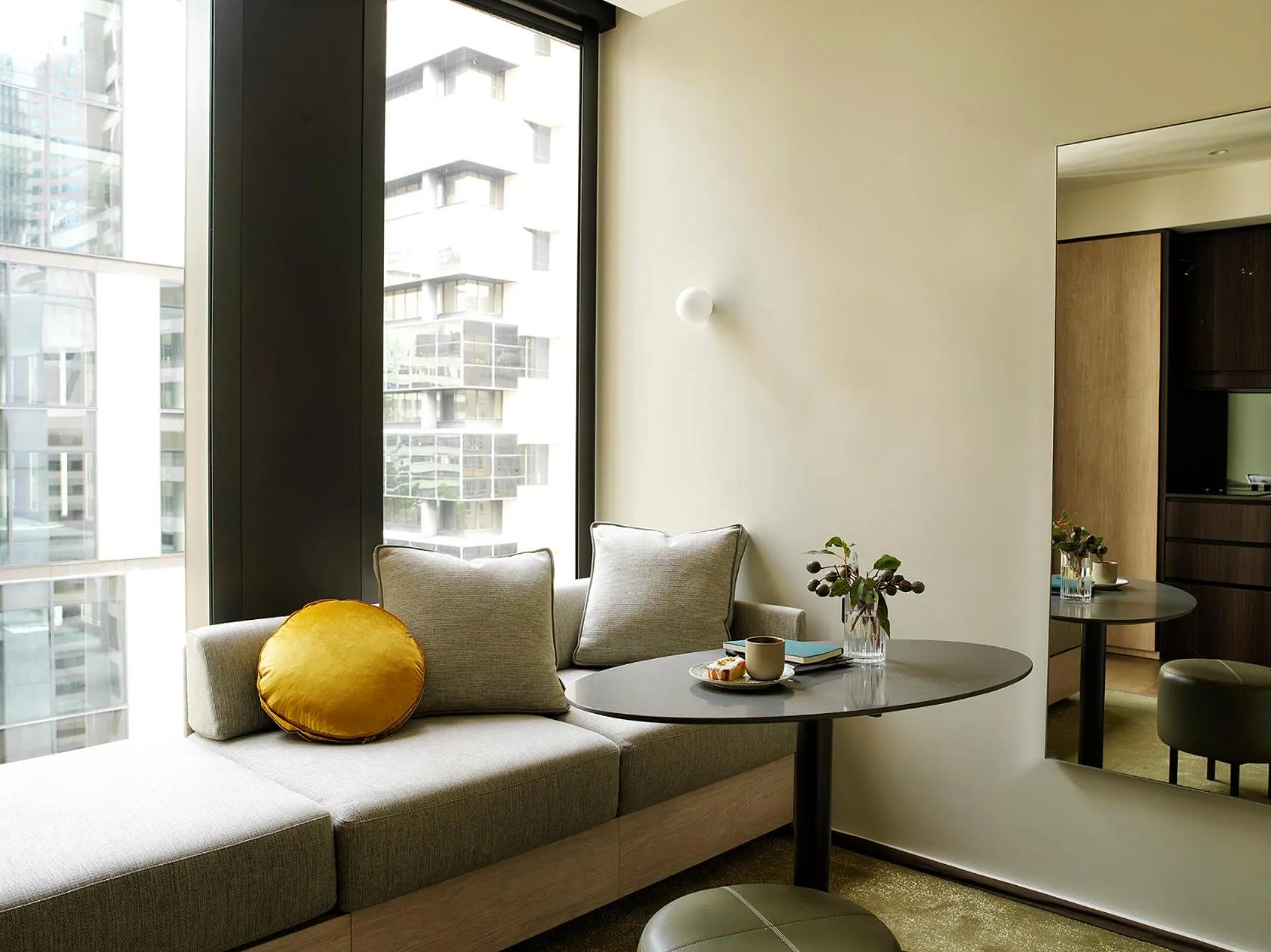 Seating area in A by Adina Sydney