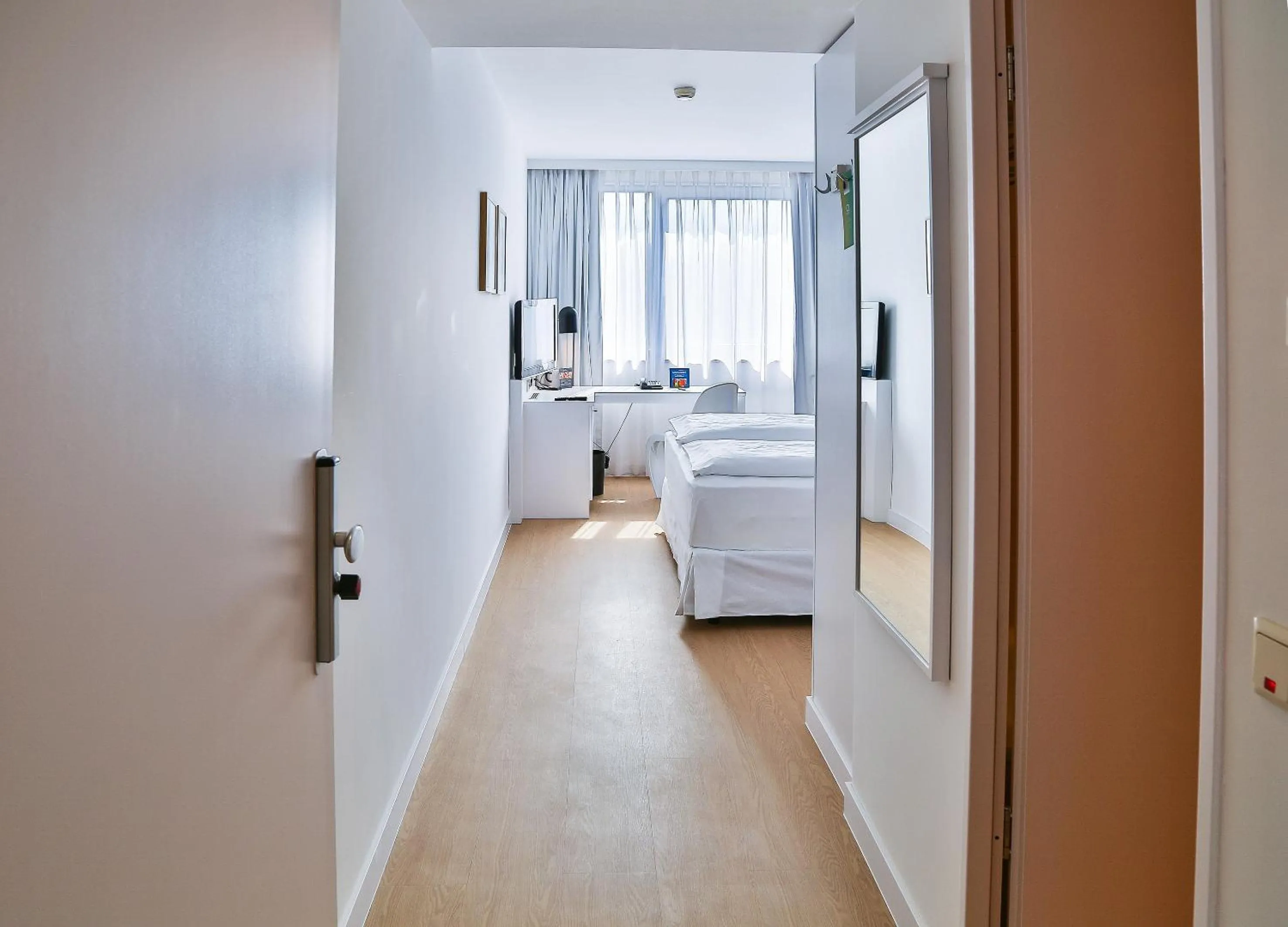 Bed in Hotel Frankfurt Messe Affiliated by Meliá