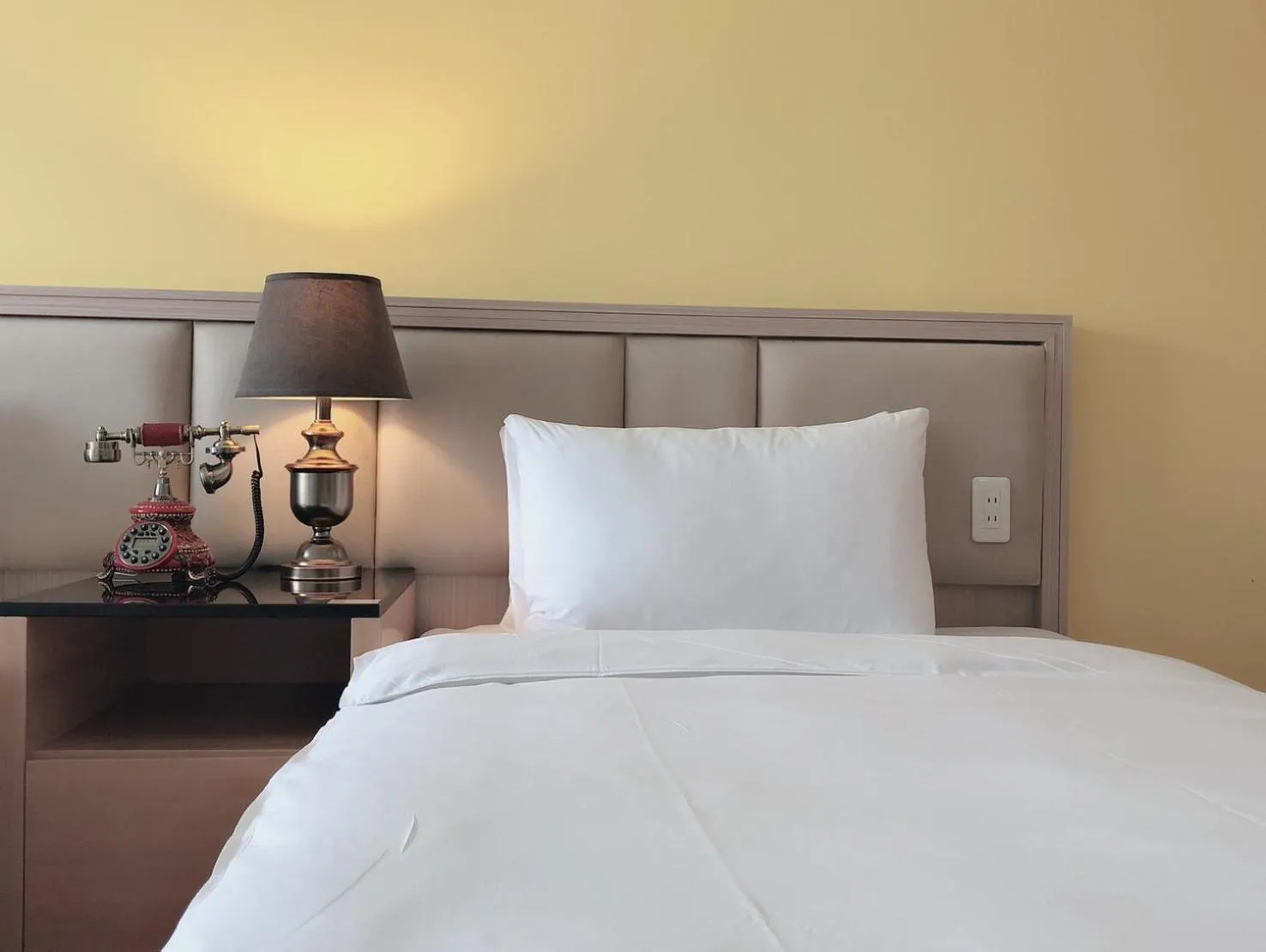 Bed in Taichung EnrichLife Hotel