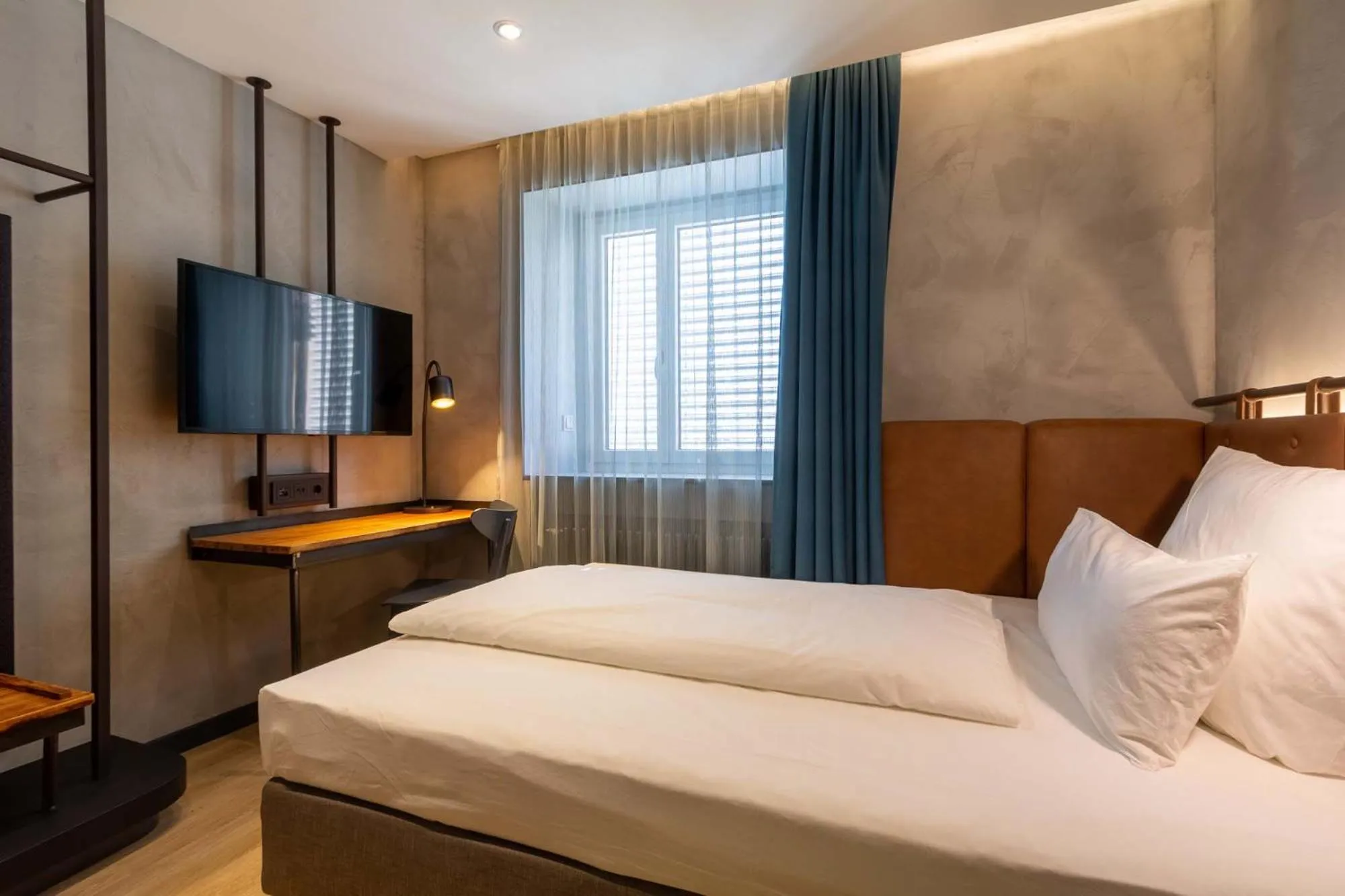 Bed in Unsöld's Factory Hotel