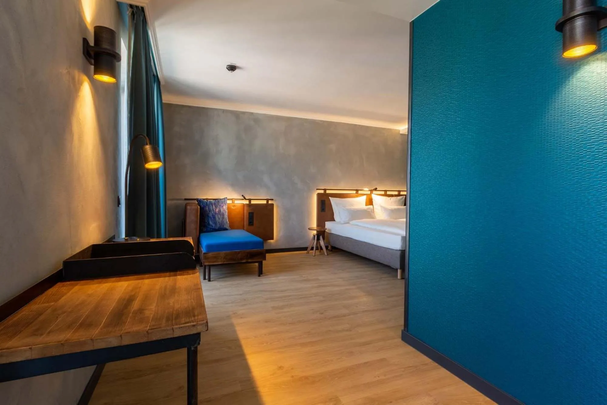 Seating area, Bed in Unsöld's Factory Hotel