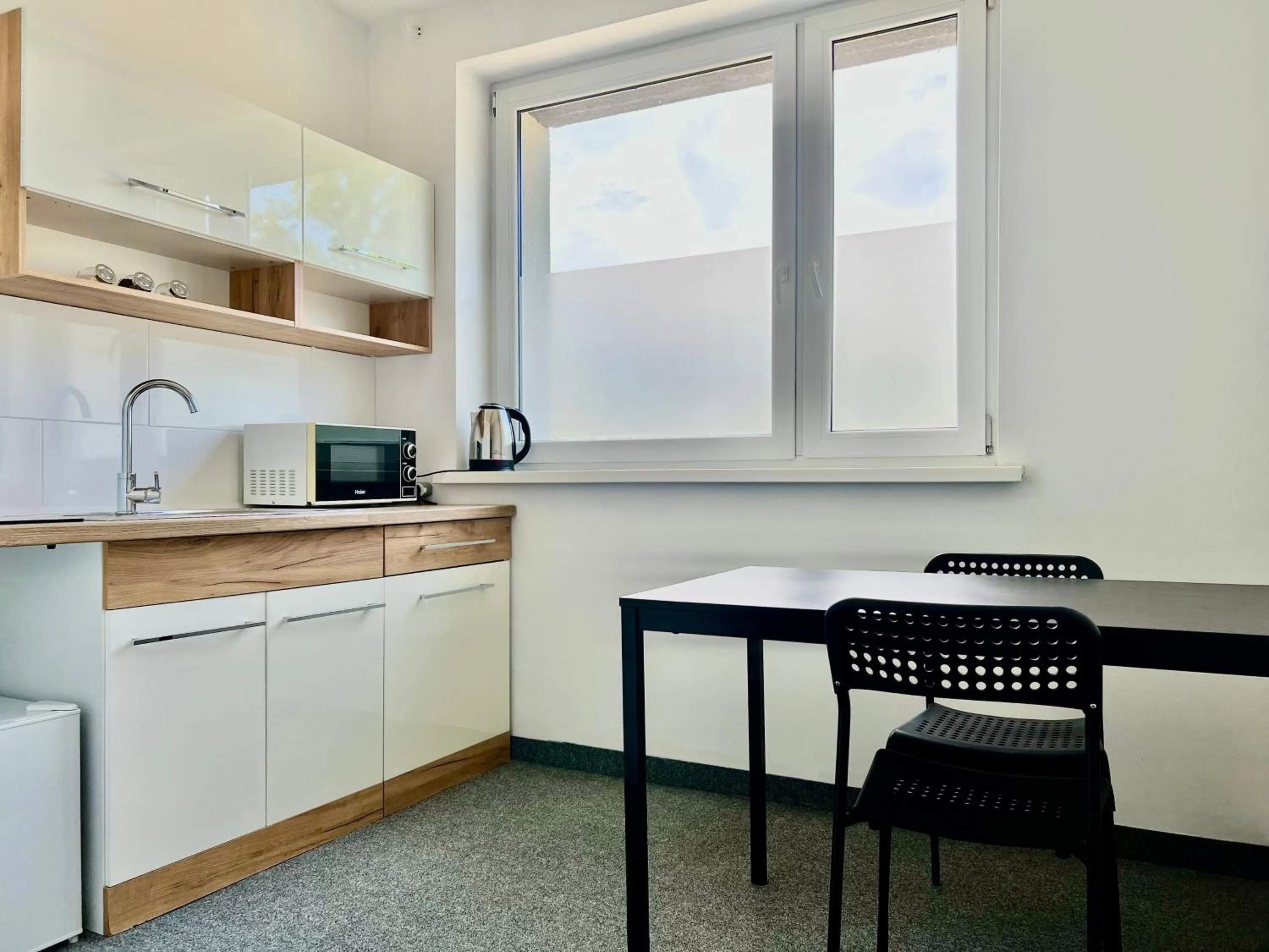 Kitchen or kitchenette in Astra Katowice - Aparthotel