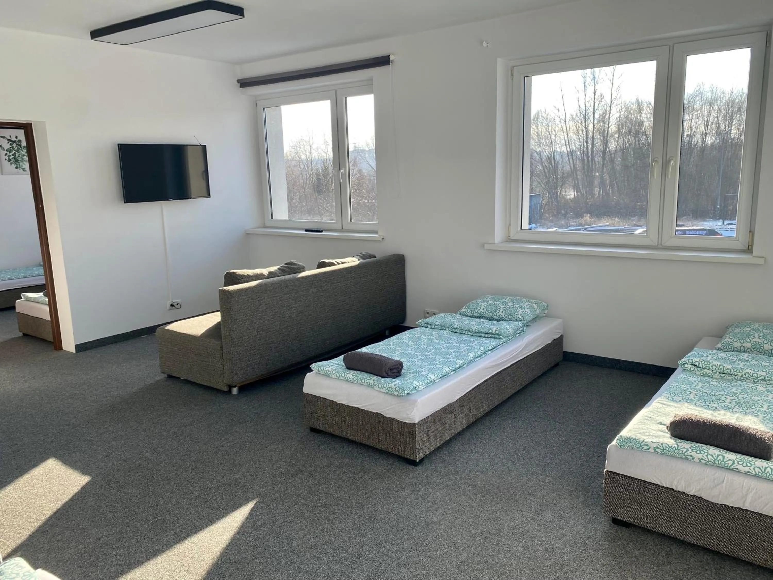 Living room, Bed in Astra Katowice - Aparthotel