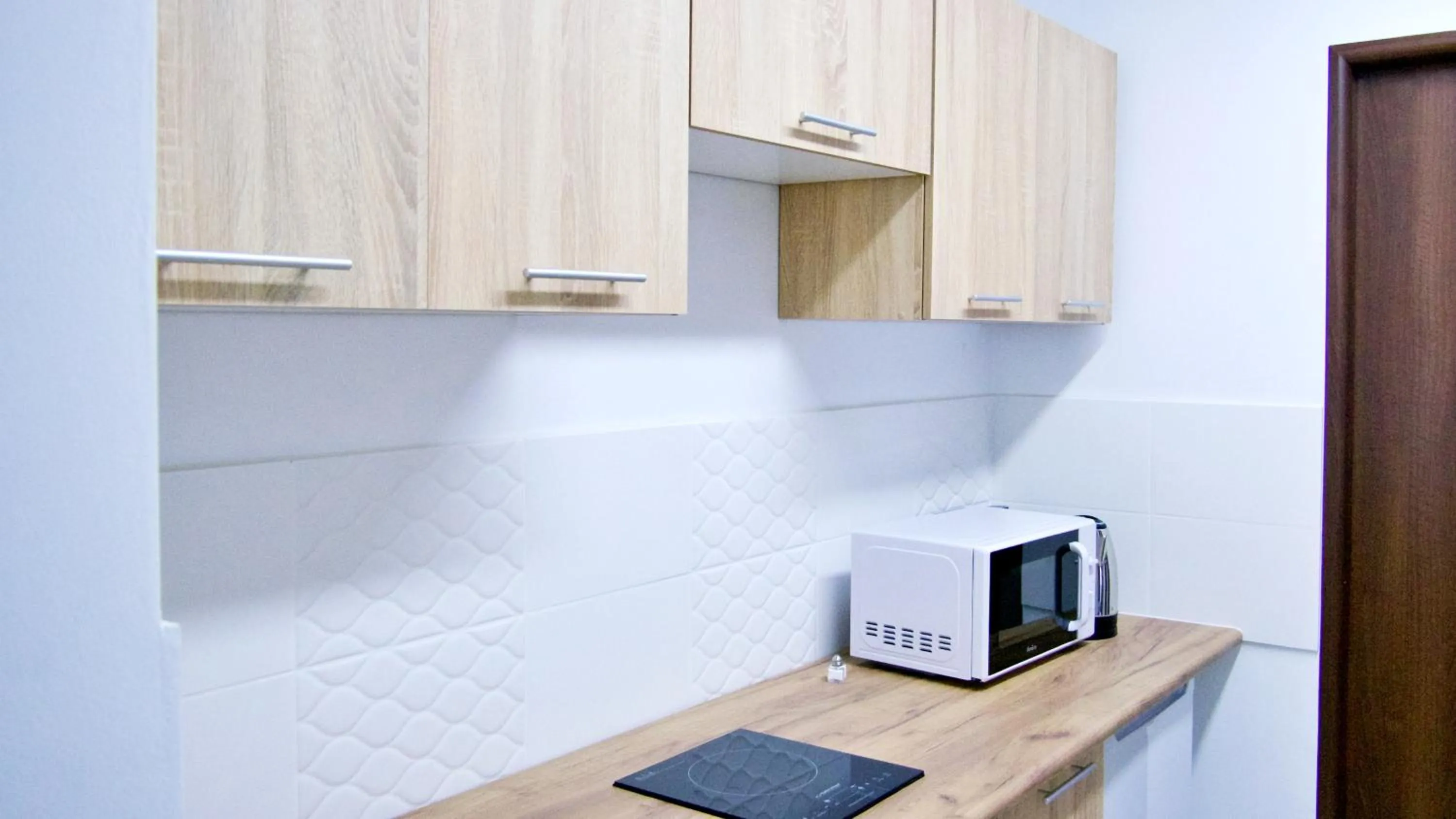 Kitchen or kitchenette in Astra Katowice - Aparthotel