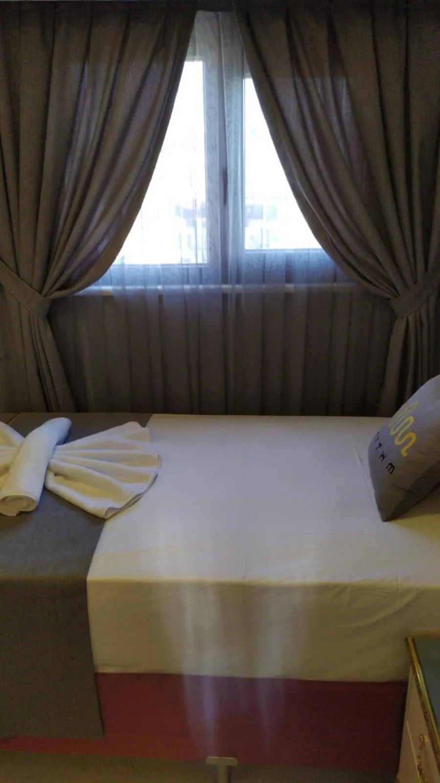 Bed in RHYTHM HOTEL