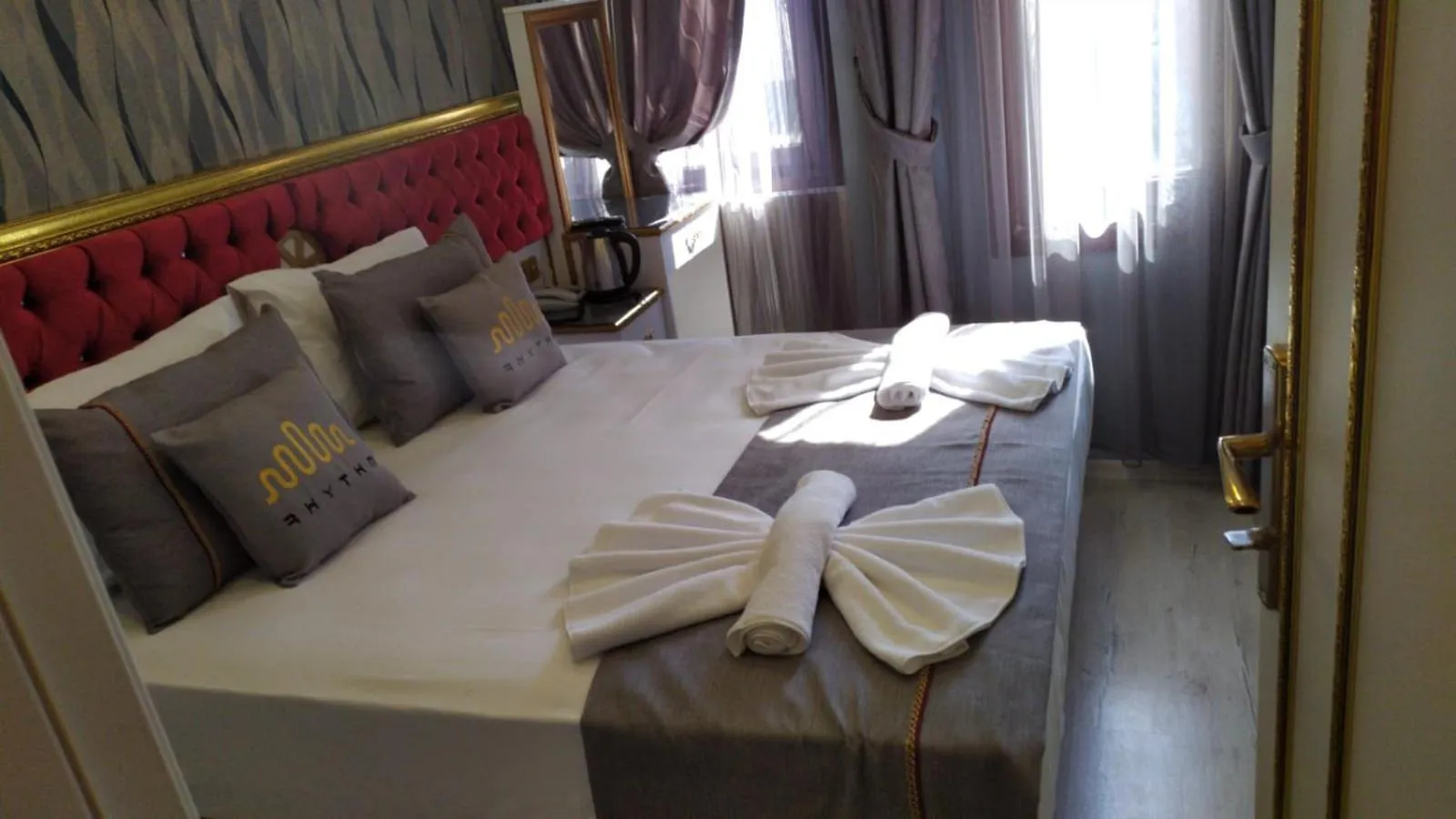 Bed in RHYTHM HOTEL