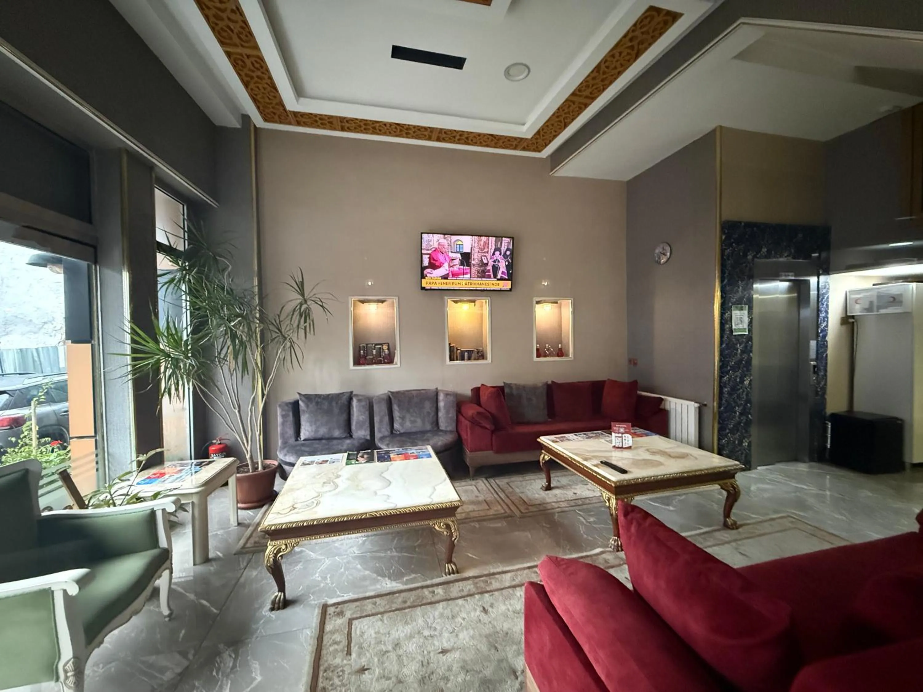 Communal lounge/ TV room in RHYTHM HOTEL