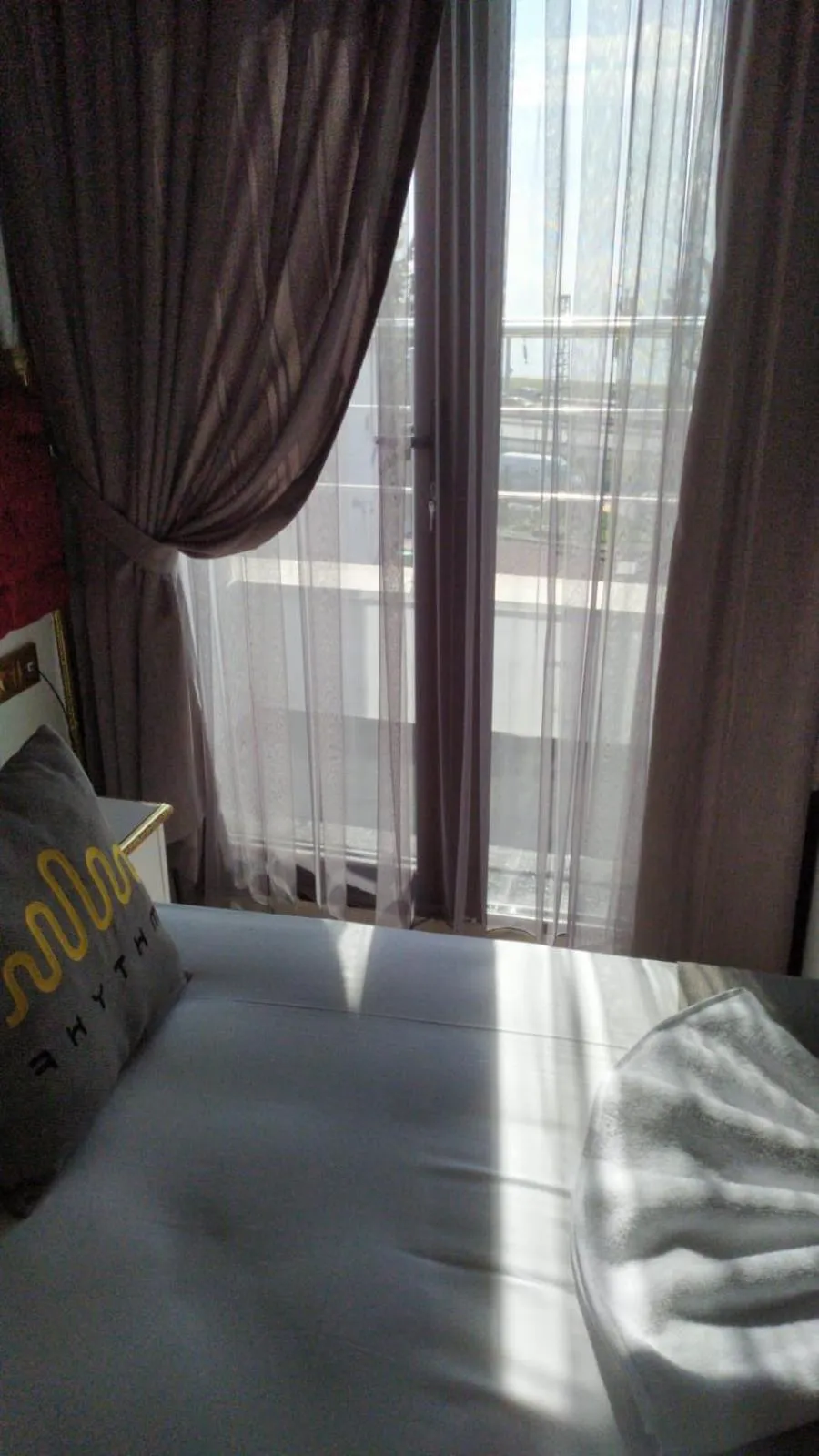 Bed in RHYTHM HOTEL