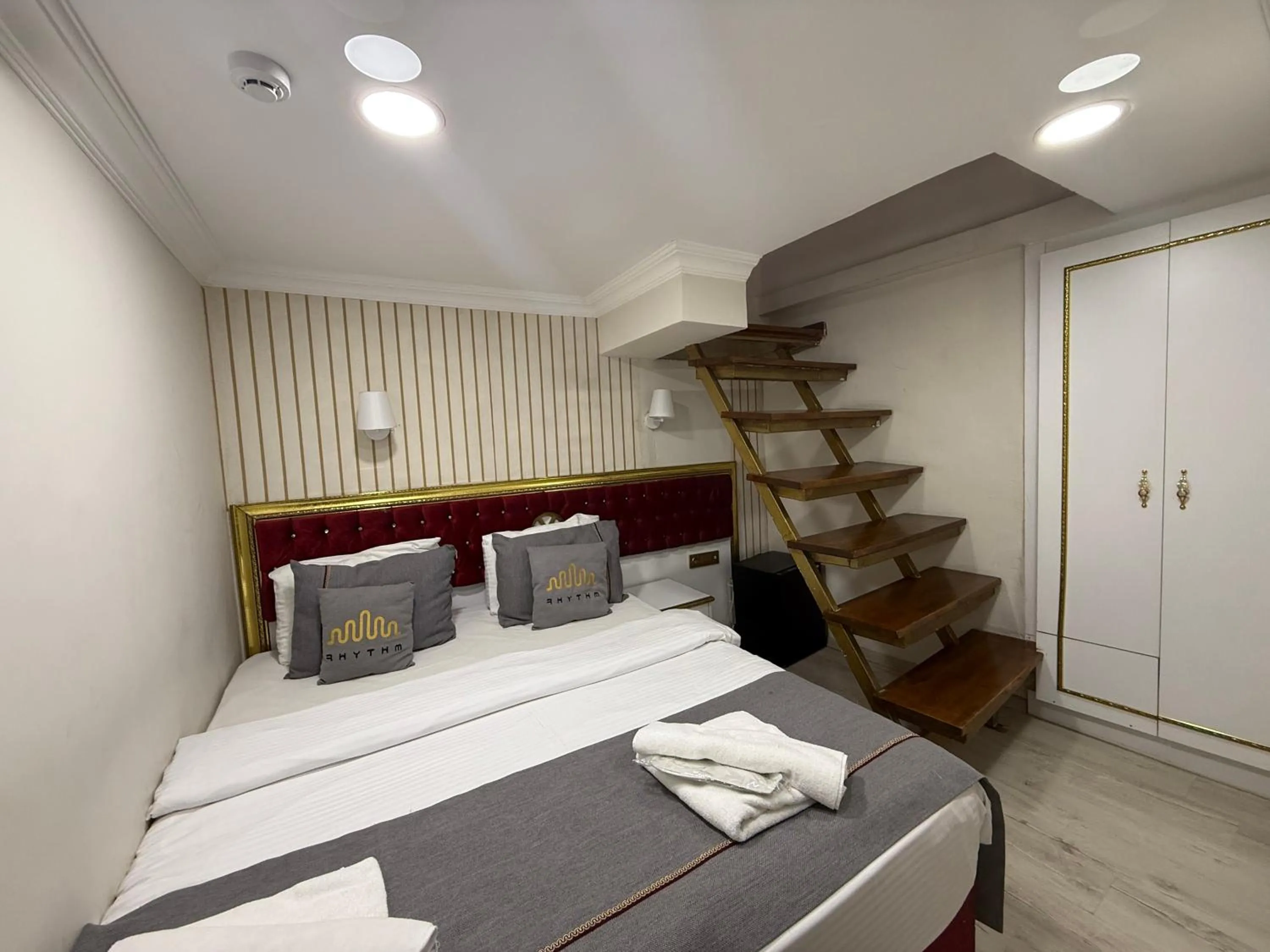 Photo of the whole room, Bed in RHYTHM HOTEL