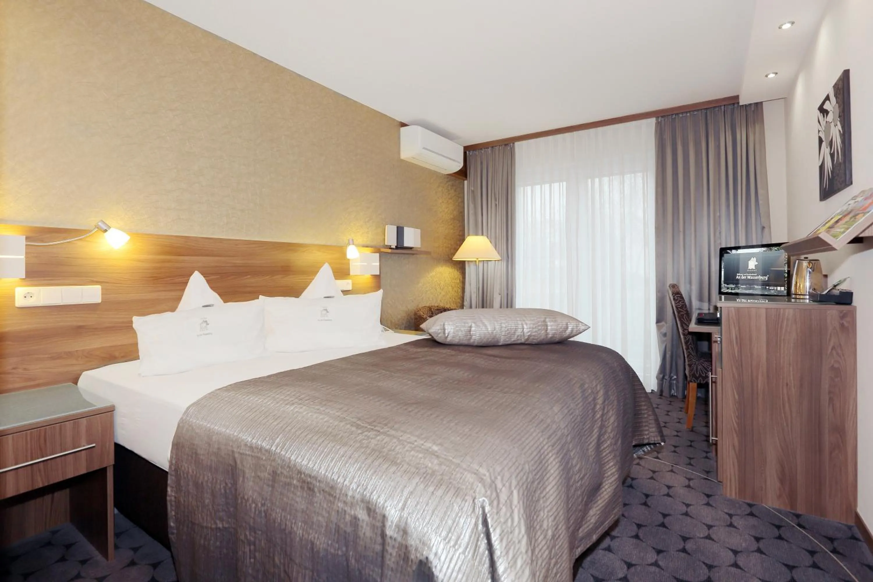 Bed in Hotel An der Wasserburg