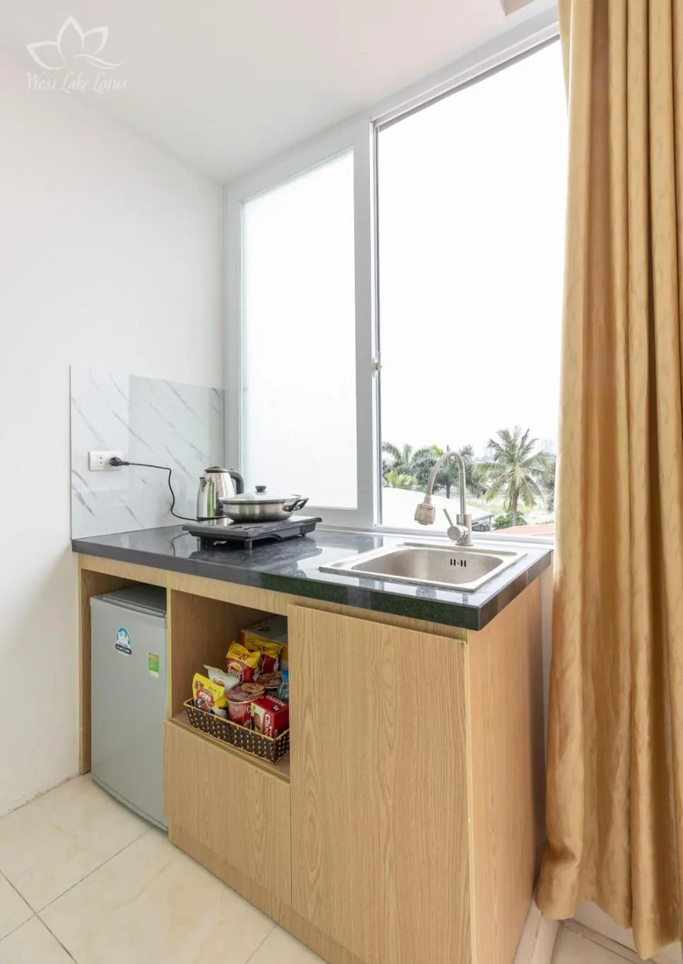 Kitchen or kitchenette in The Lakeview - West Lake Lotus Apartments