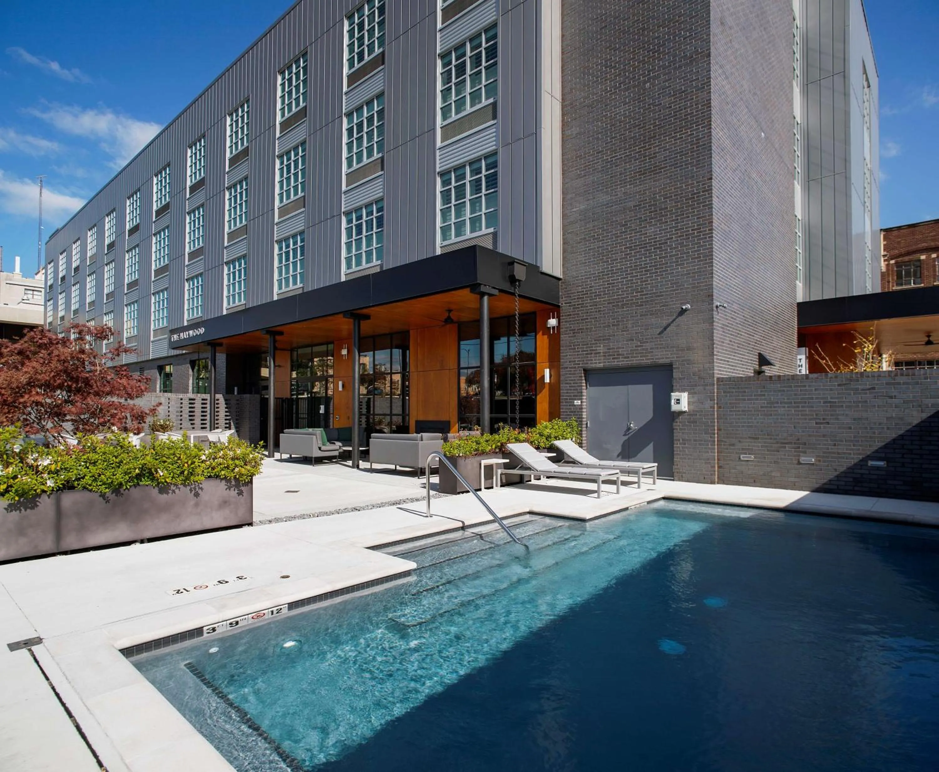 Pool view in The Haywood, Tapestry Collection by Hilton
