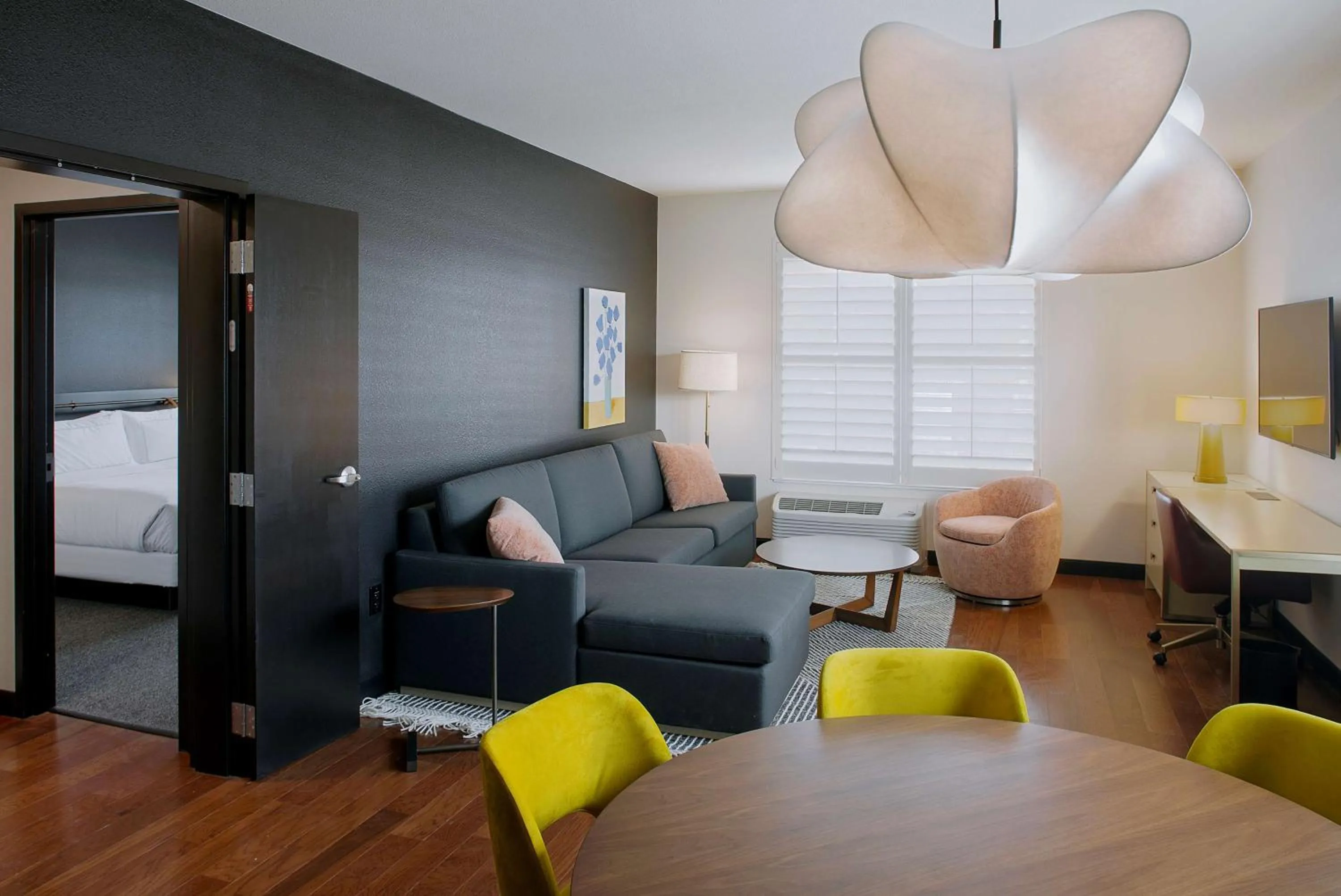 Living room in The Haywood, Tapestry Collection by Hilton