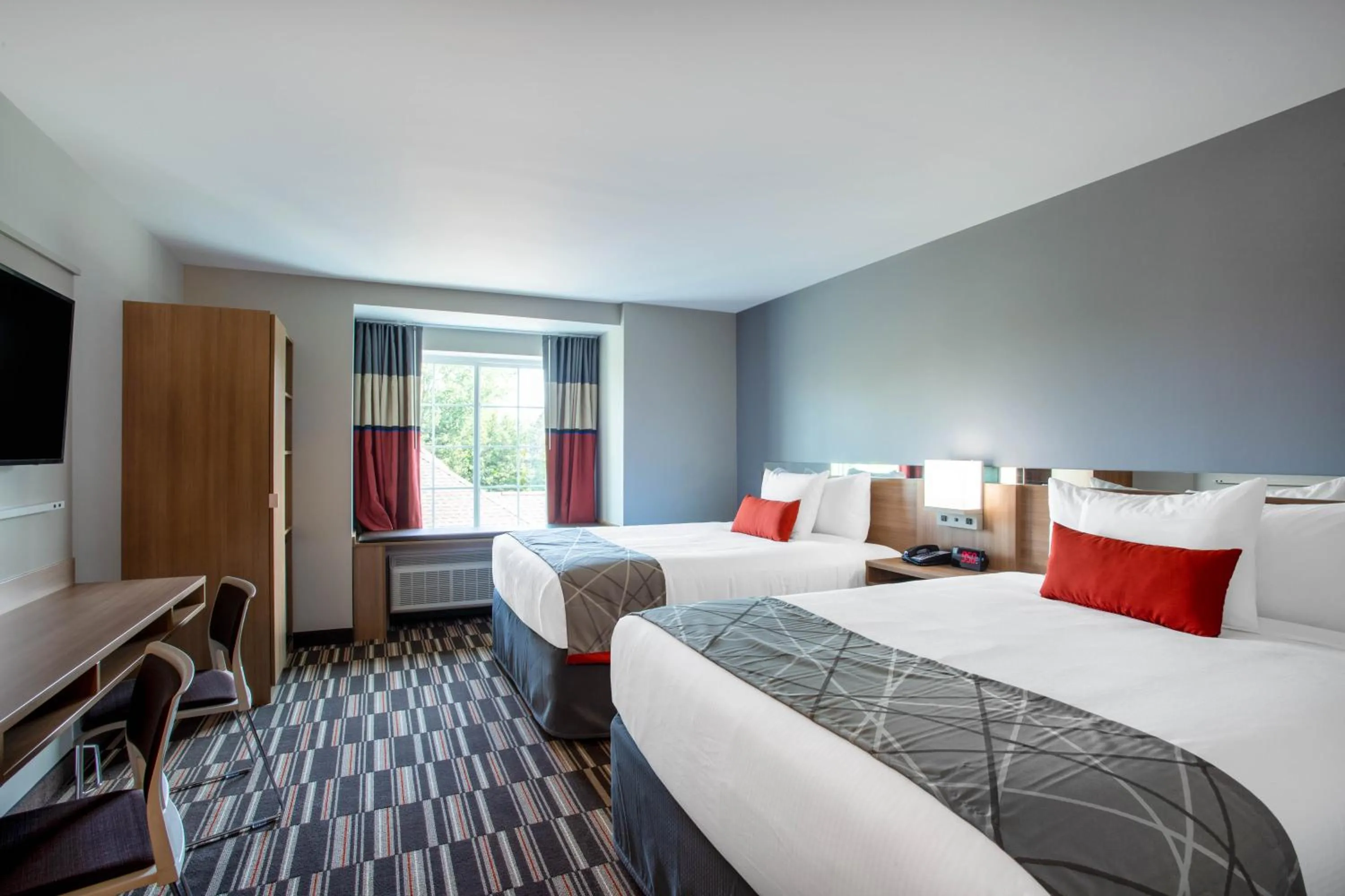 Bed in Microtel Inn & Suites by Wyndham Amsterdam NY