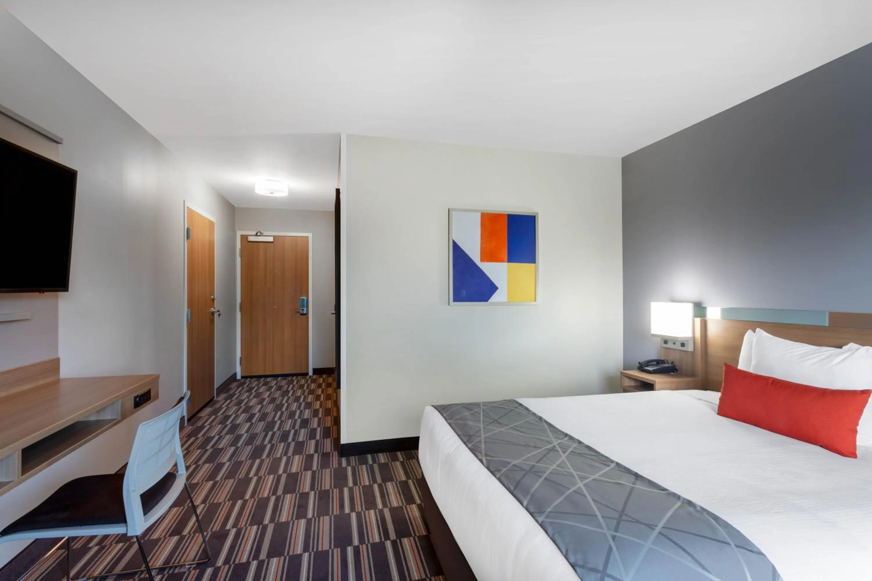 Bed in Microtel Inn & Suites by Wyndham Amsterdam NY