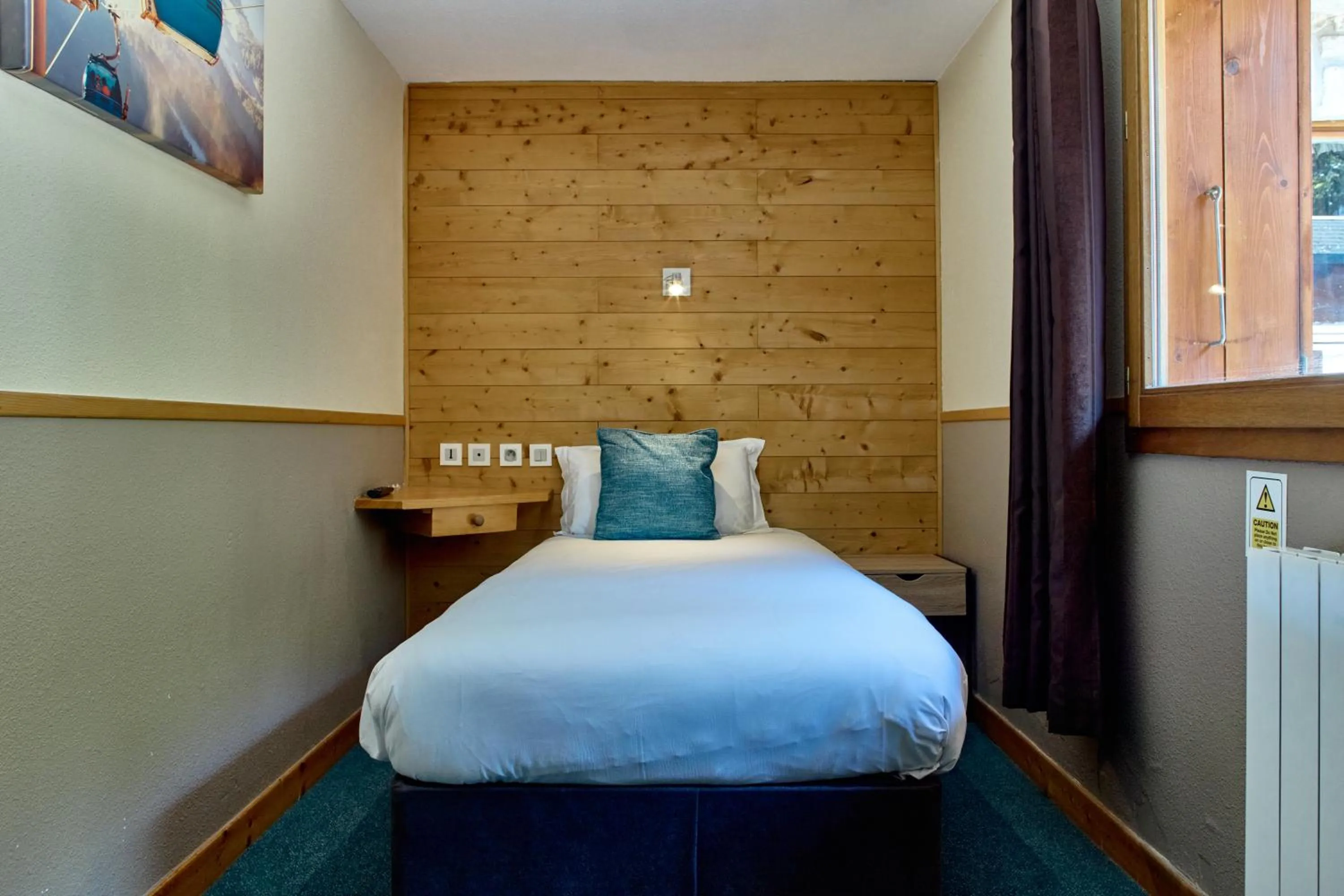 Bed in Hôtel Les Grangettes