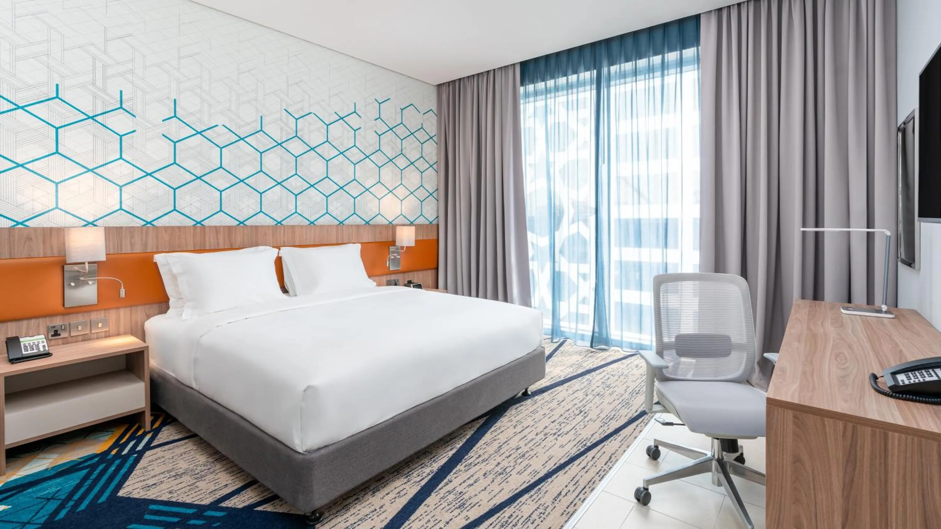 Photo of the whole room, Bed in Holiday Inn & Suites Al Jubail by IHG