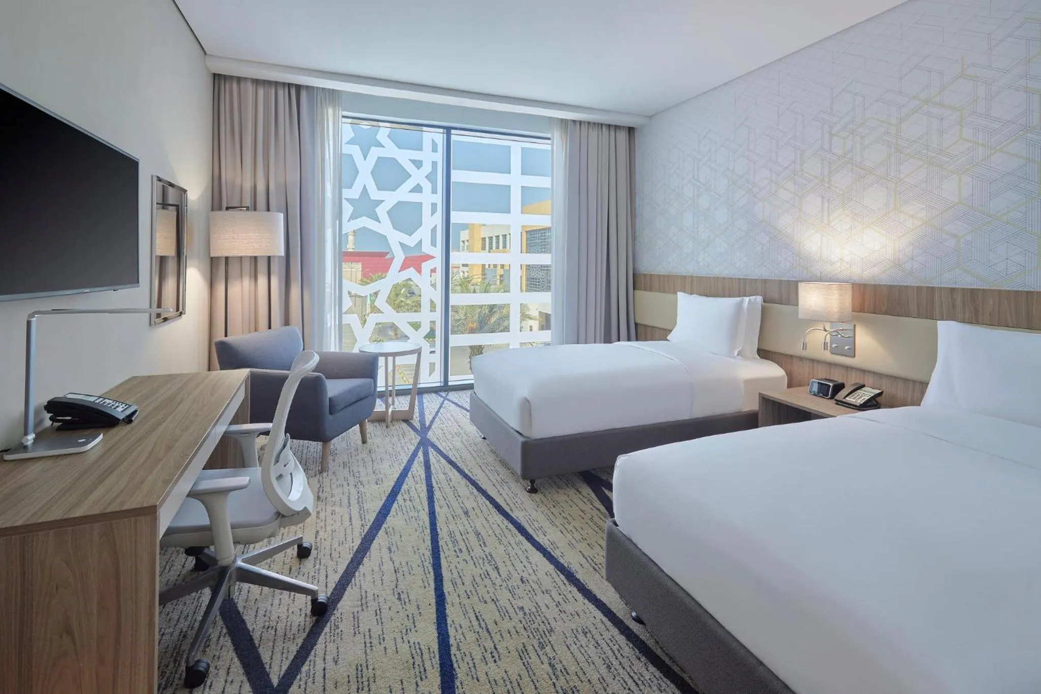 Photo of the whole room, Bed in Holiday Inn & Suites Al Jubail by IHG