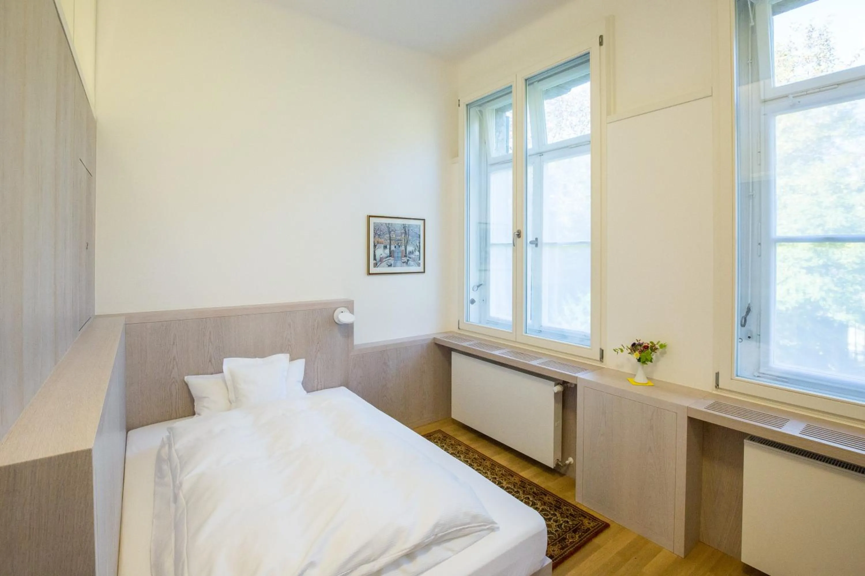 Bed in Gästehaus der Katholischen Akademie in Bayern