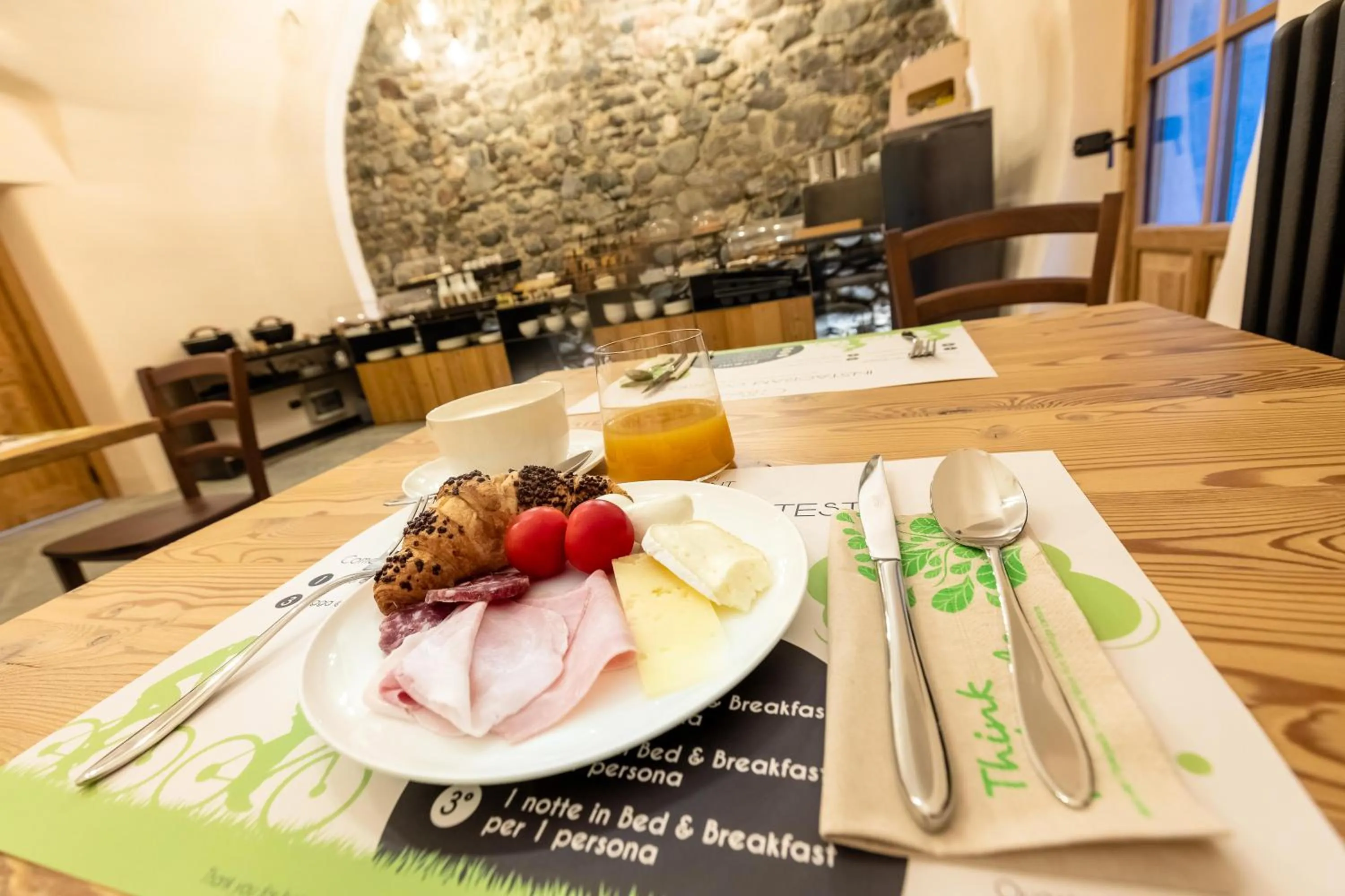 Buffet breakfast in Curt di Clement Eco Mobility Hotel