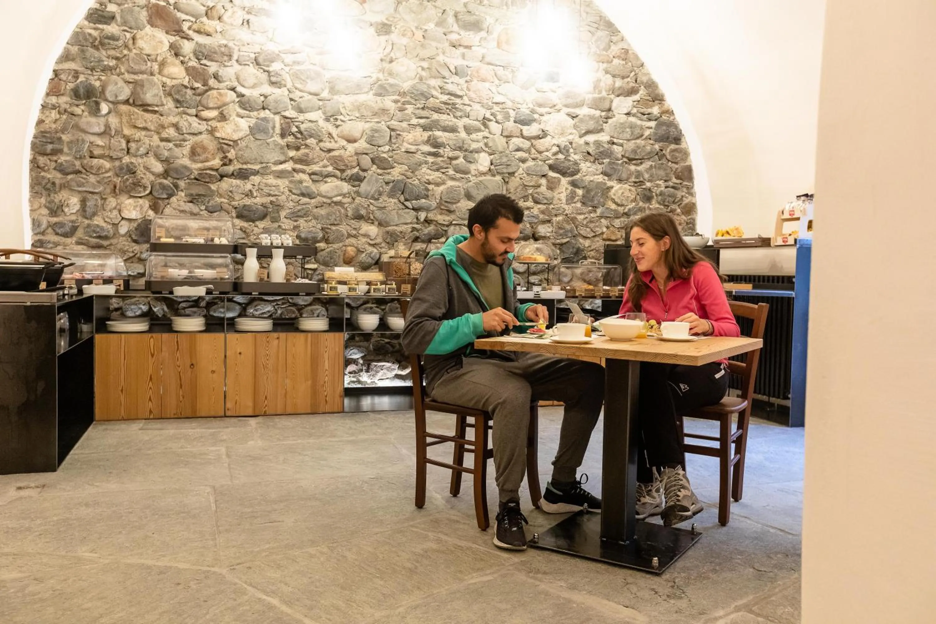 Buffet breakfast in Curt di Clement Eco Mobility Hotel