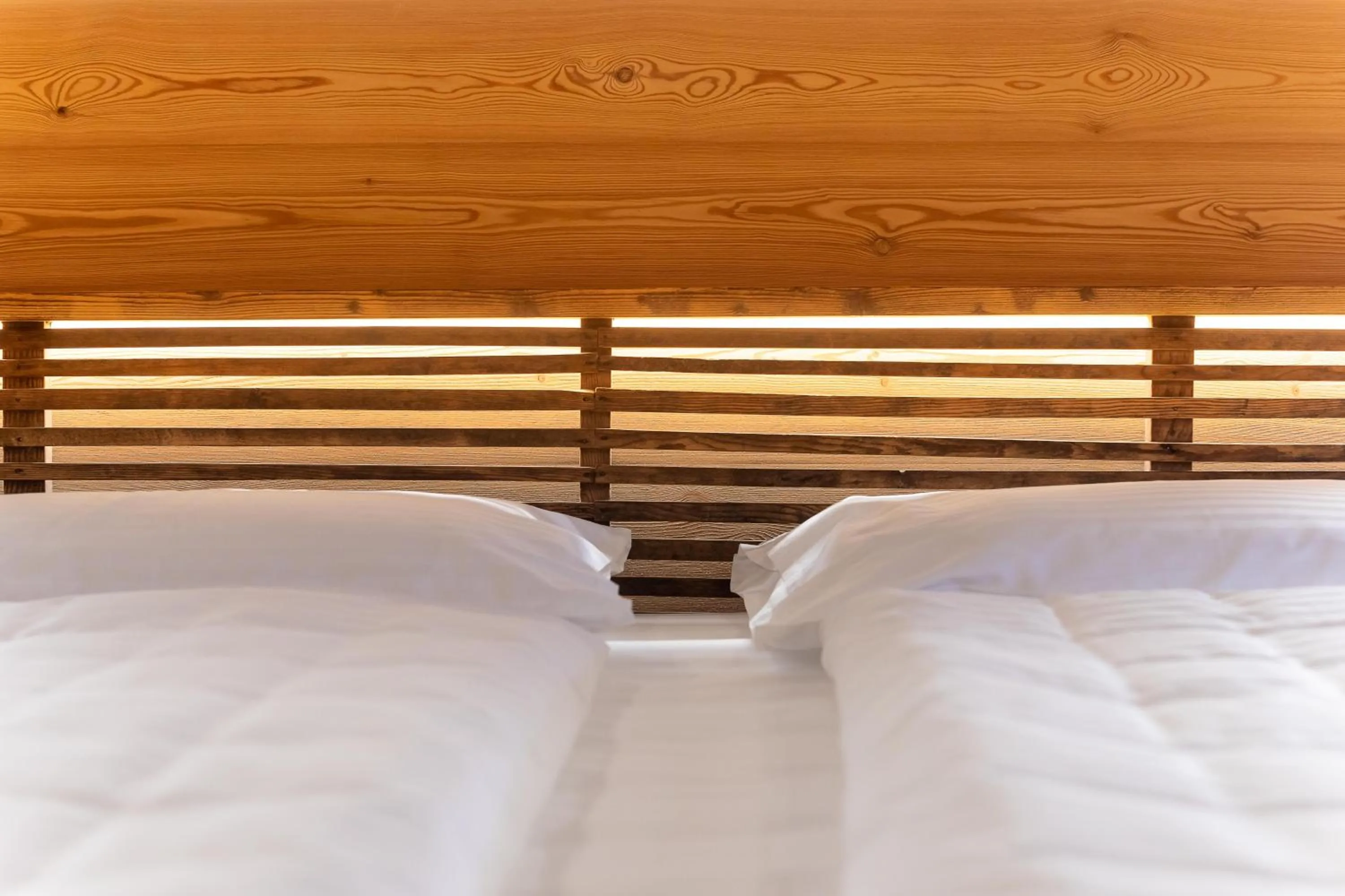 Decorative detail, Bed in Curt di Clement Eco Mobility Hotel