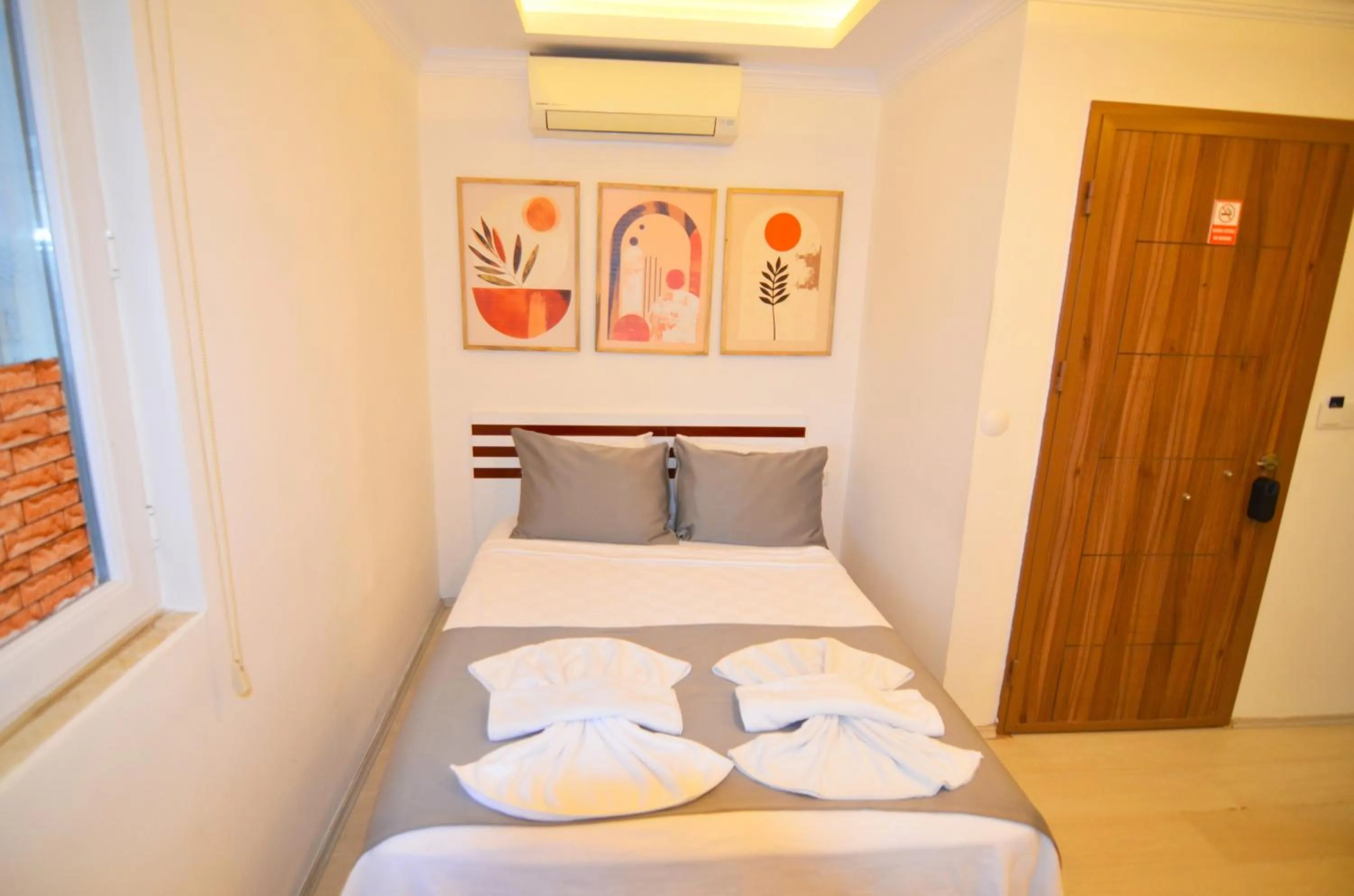 Bed in Mykonut Apart Hotel