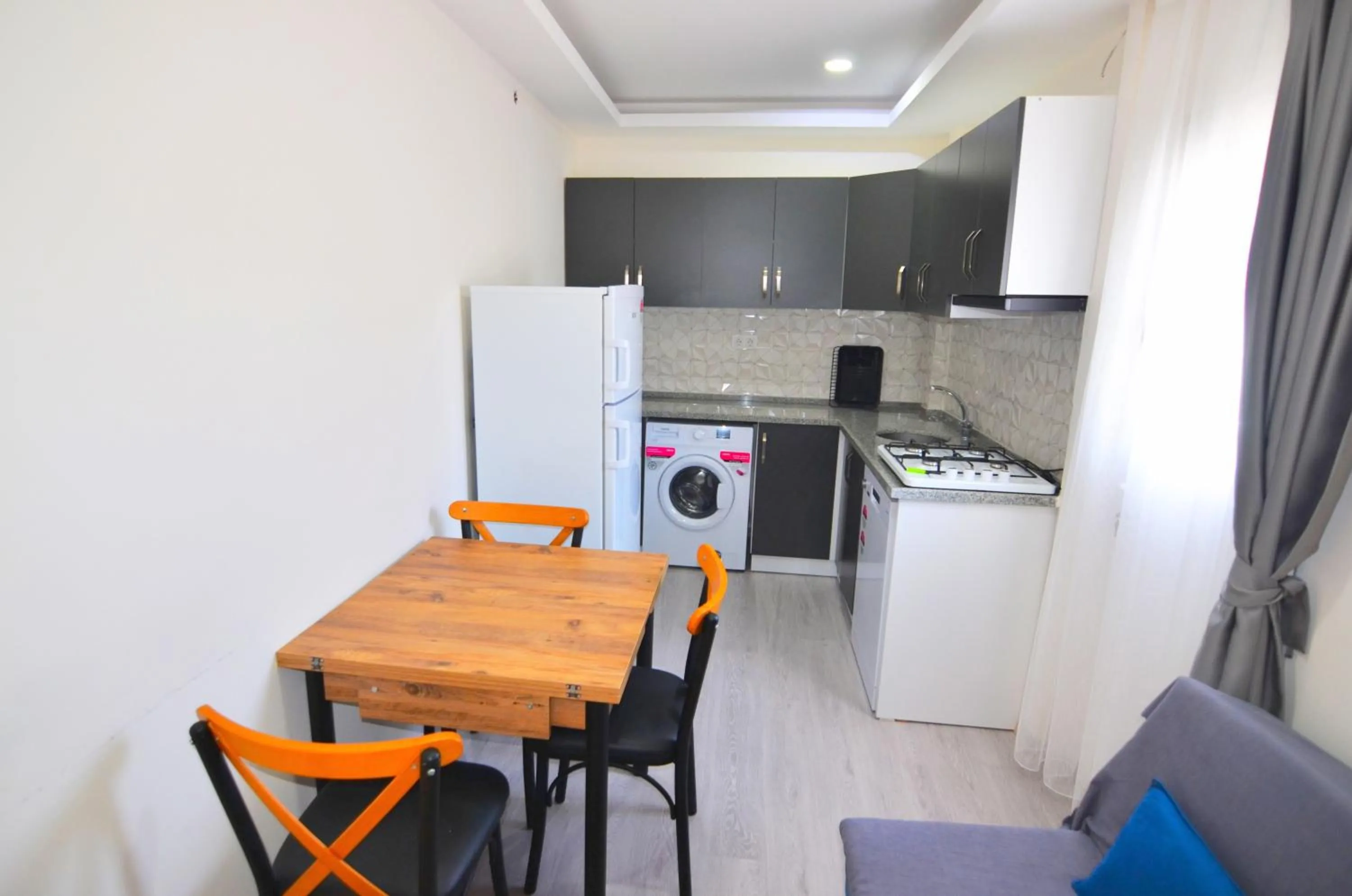 Kitchen or kitchenette in Mykonut Apart Hotel