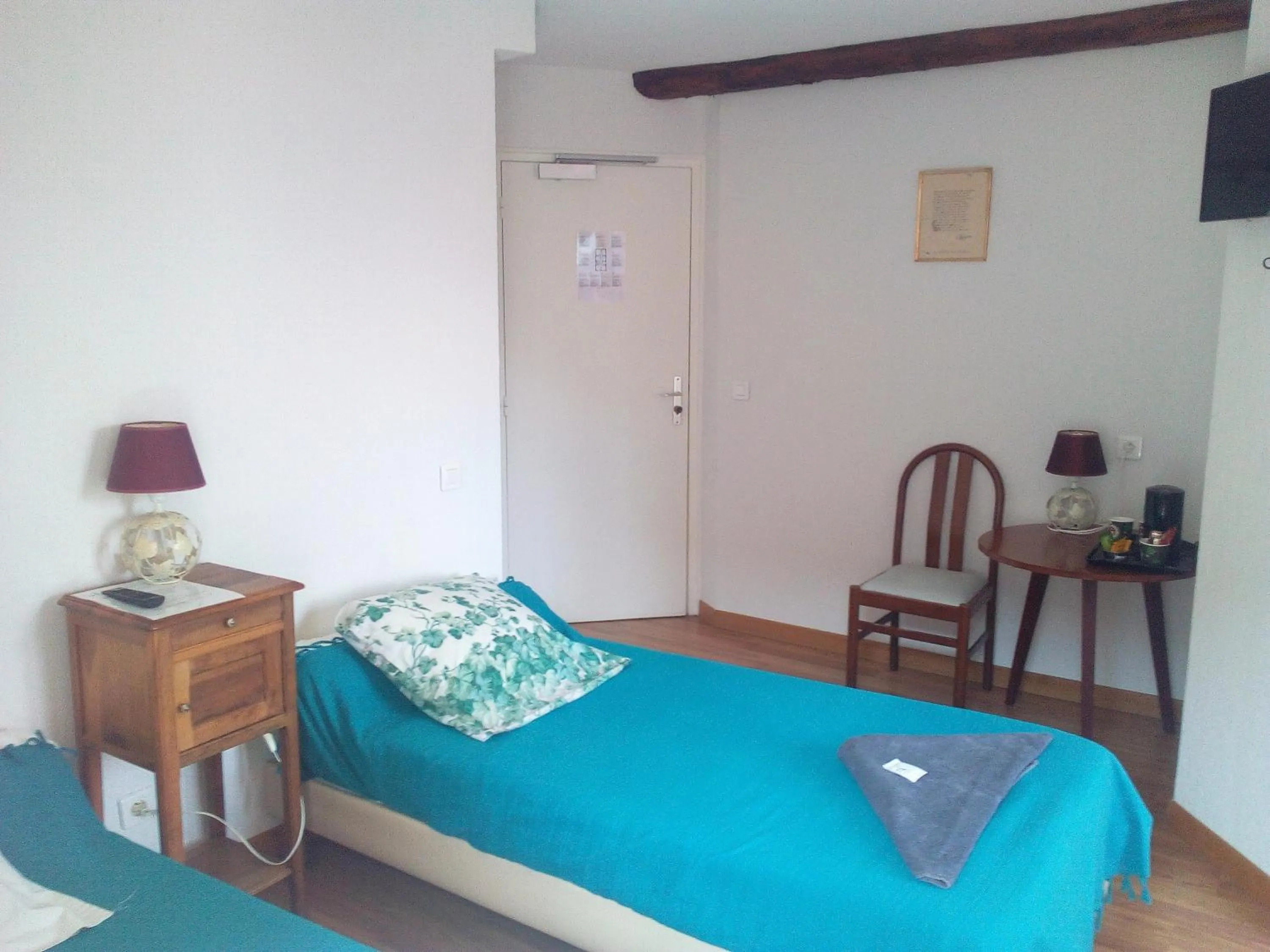 Bed in Le Relais des Cavaliers