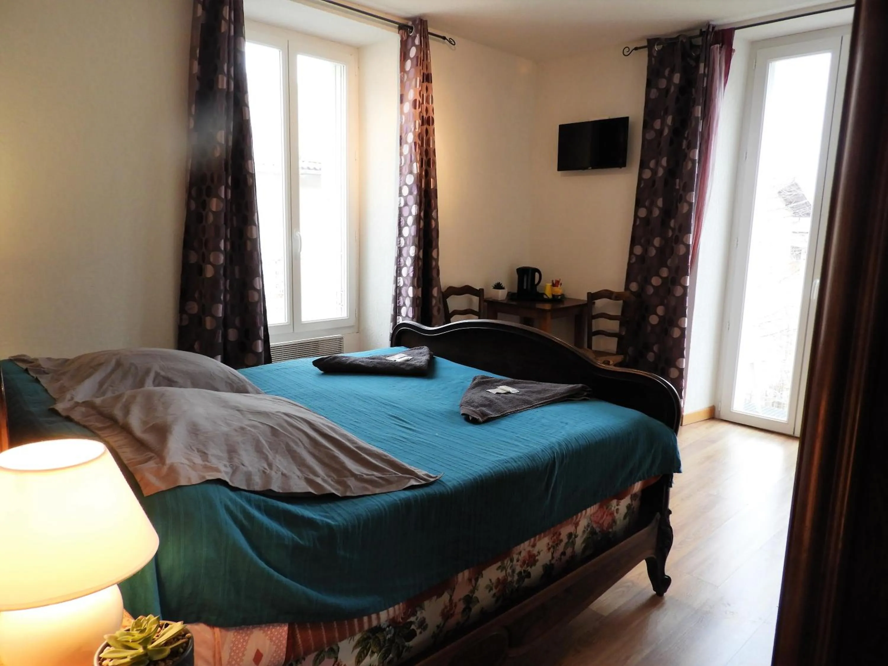 Bed in Le Relais des Cavaliers