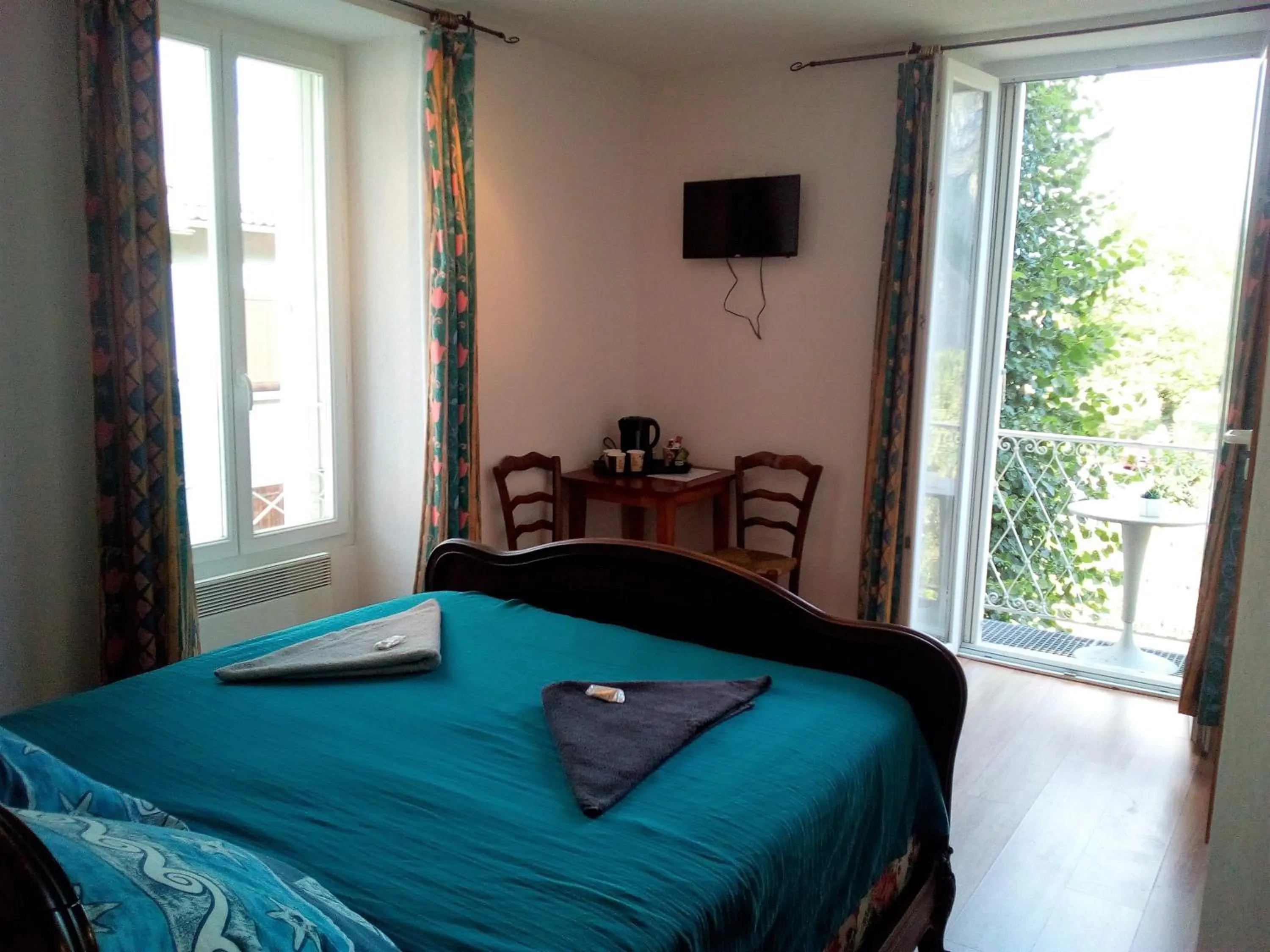 Bed in Le Relais des Cavaliers