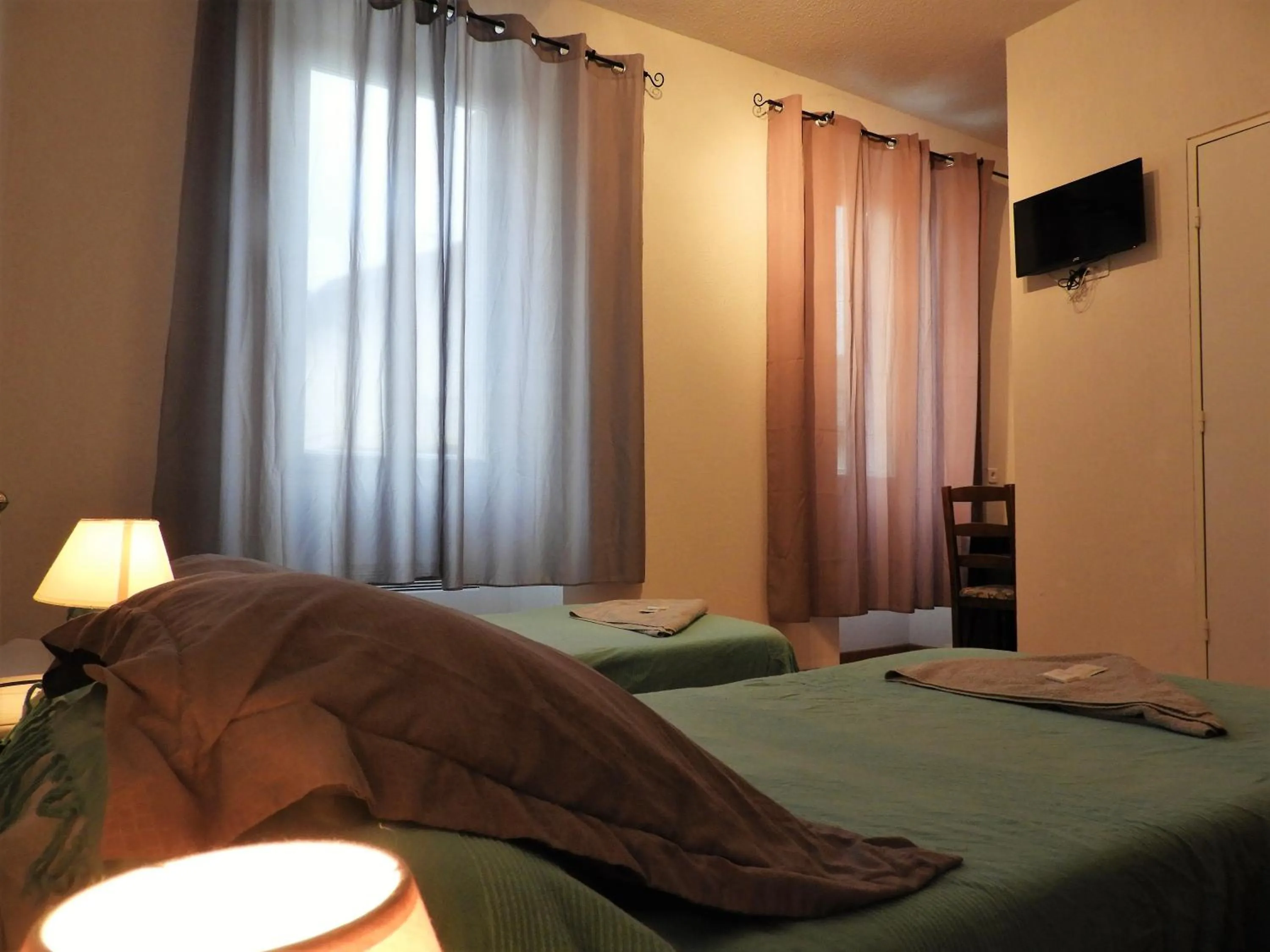 Bed in Le Relais des Cavaliers