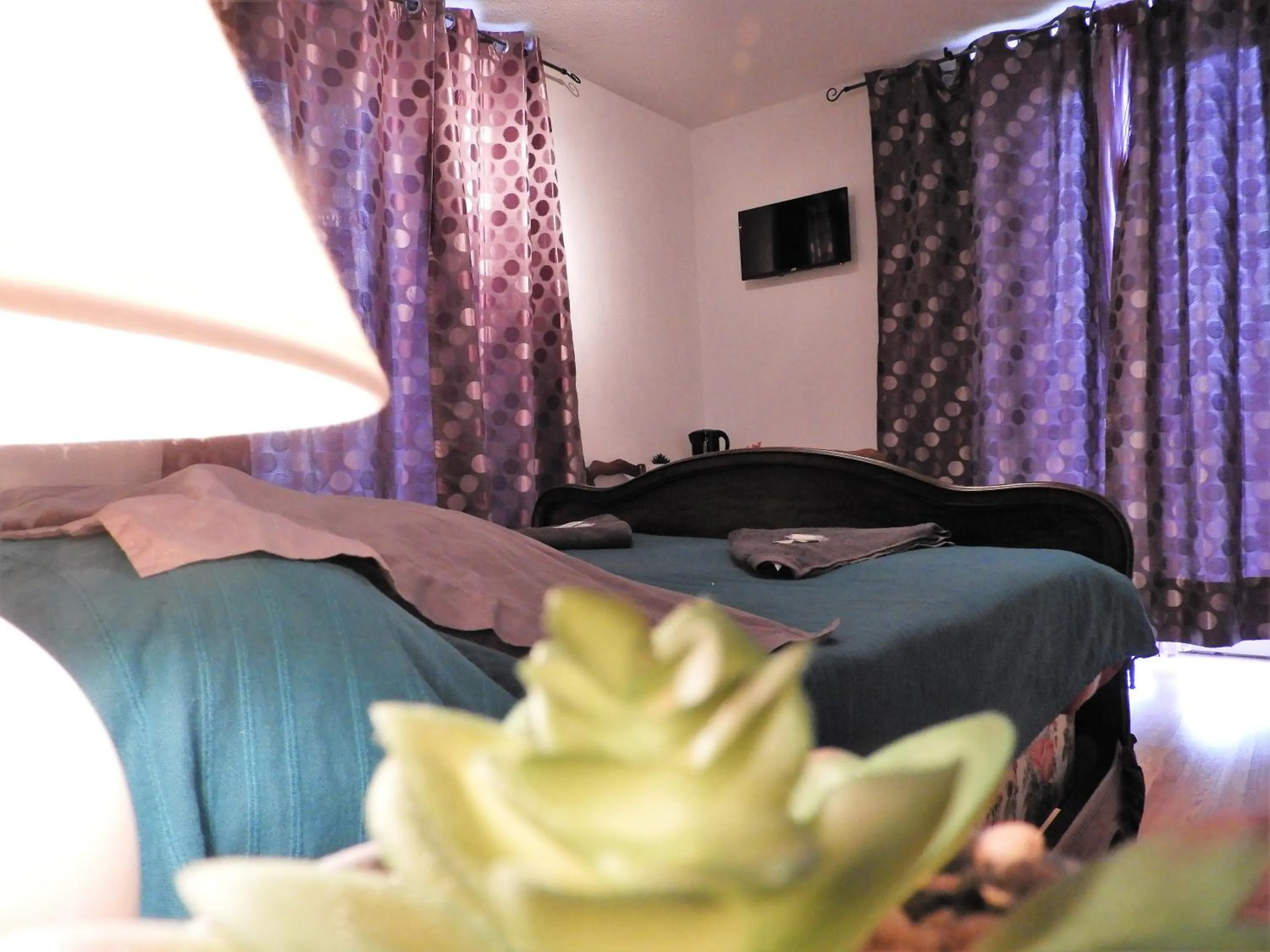 Bed in Le Relais des Cavaliers