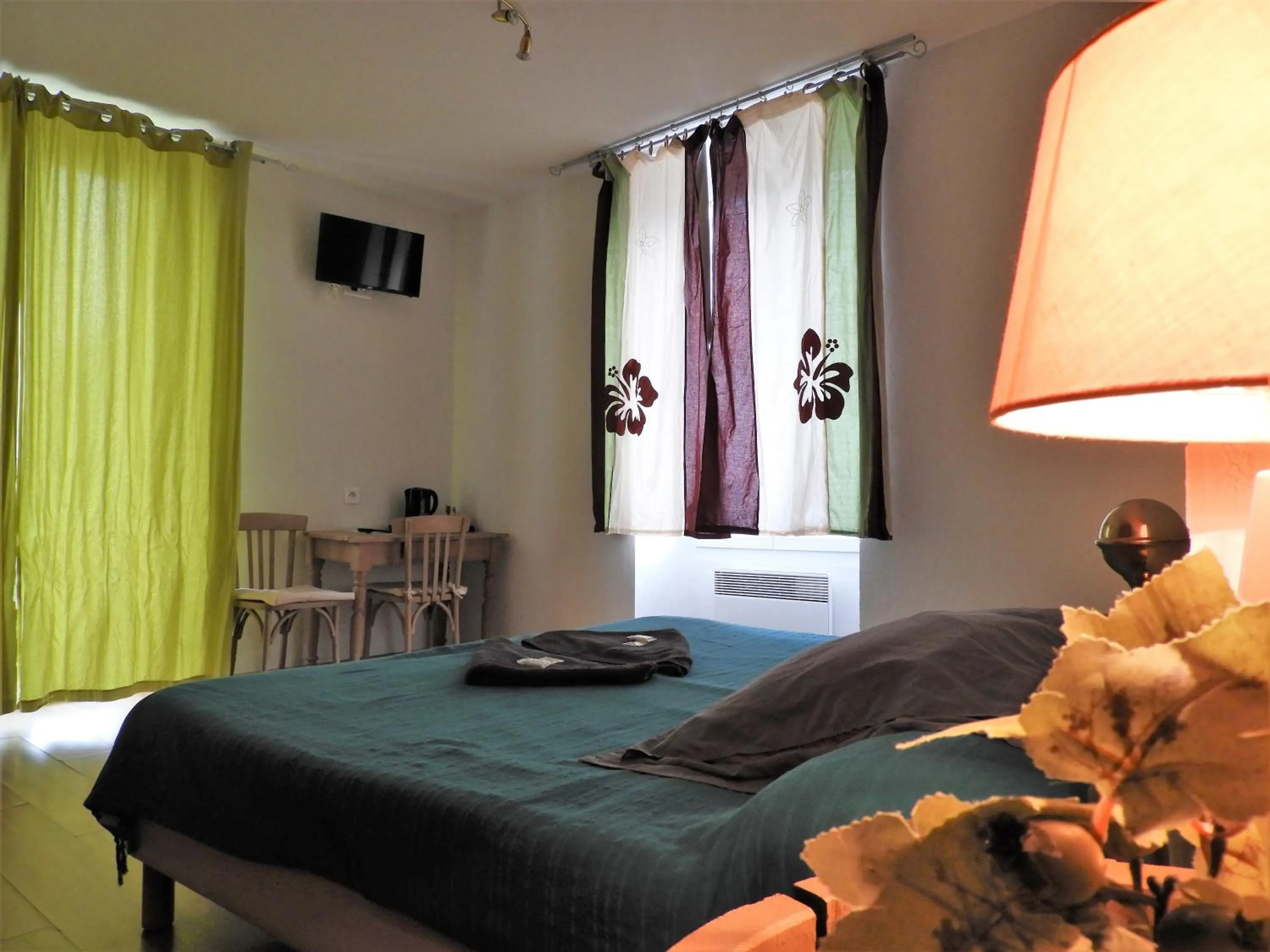 Bed in Le Relais des Cavaliers