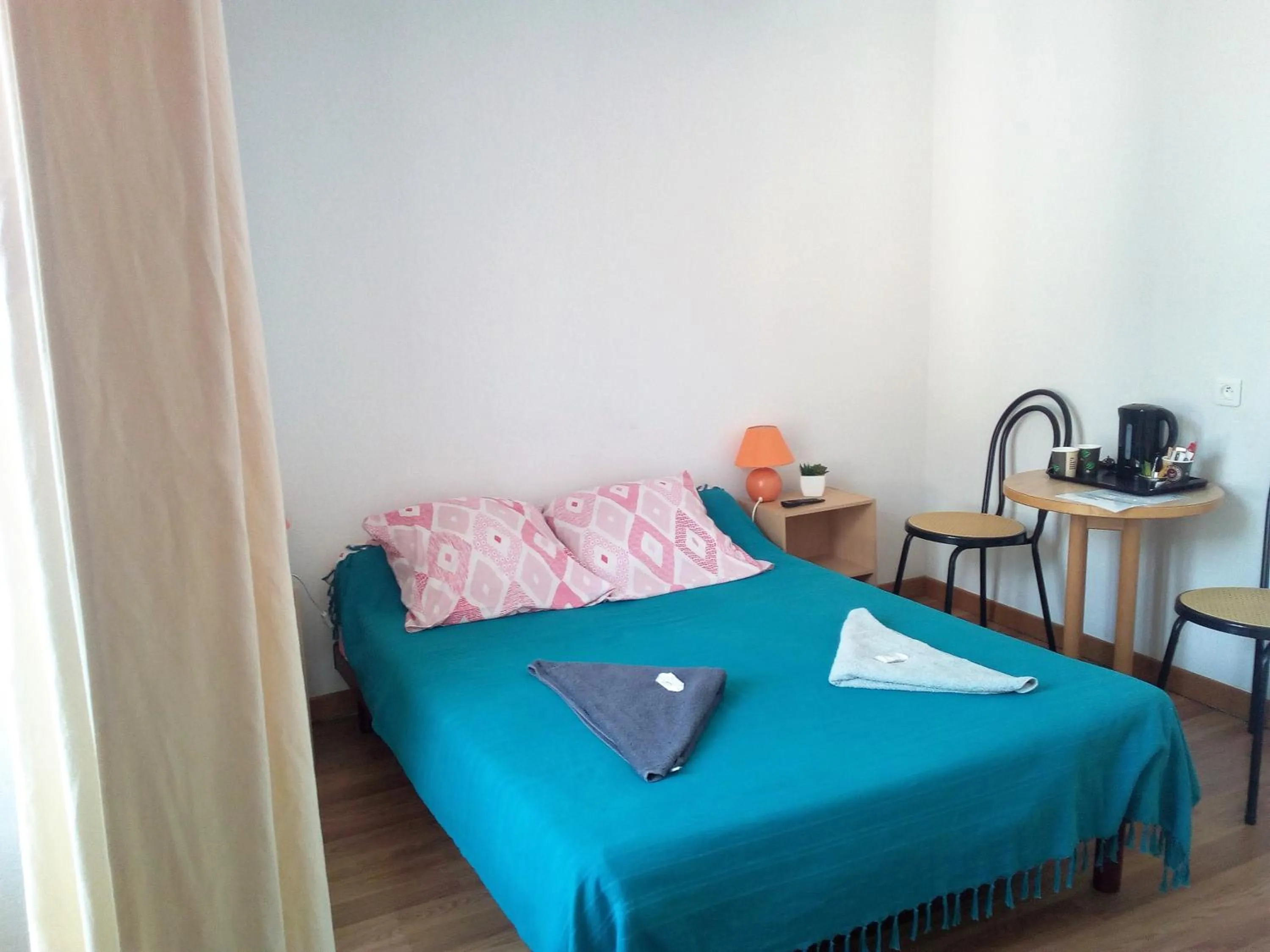 Bed in Le Relais des Cavaliers