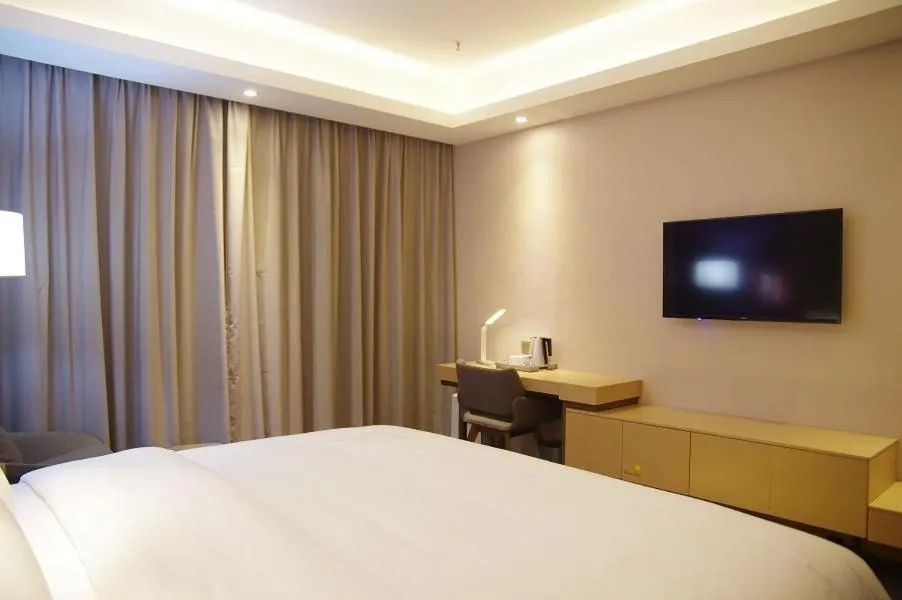 Bed in Lavande Hotel Neijiang High-speed Railway Station Peace Plaza