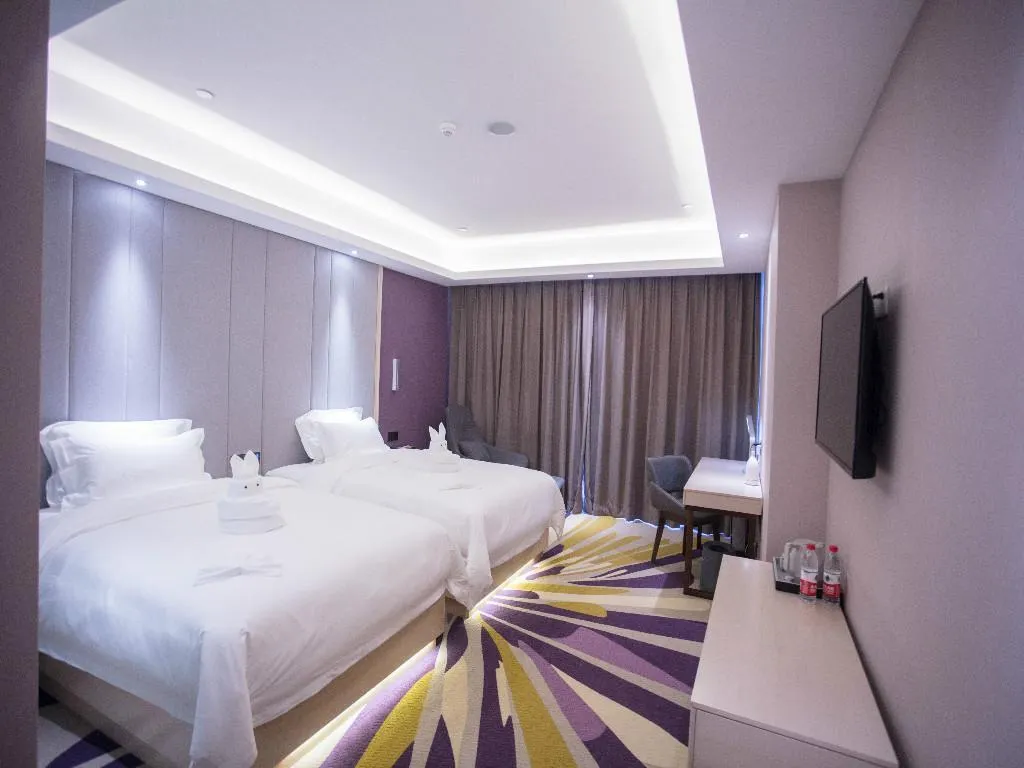 Bed in Lavande Hotel Korla city government swan lake