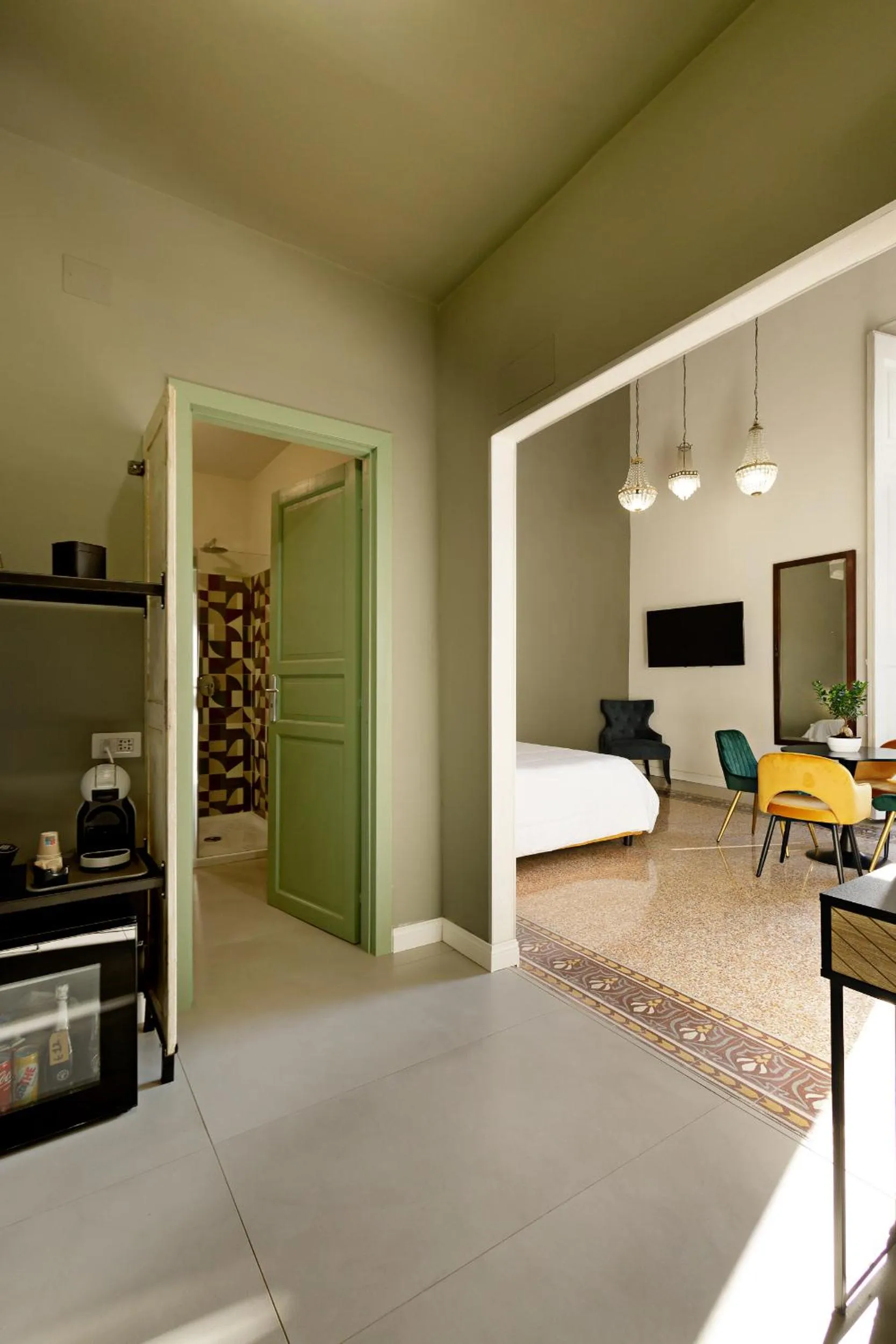 Seating area, Bed in Palà Suites