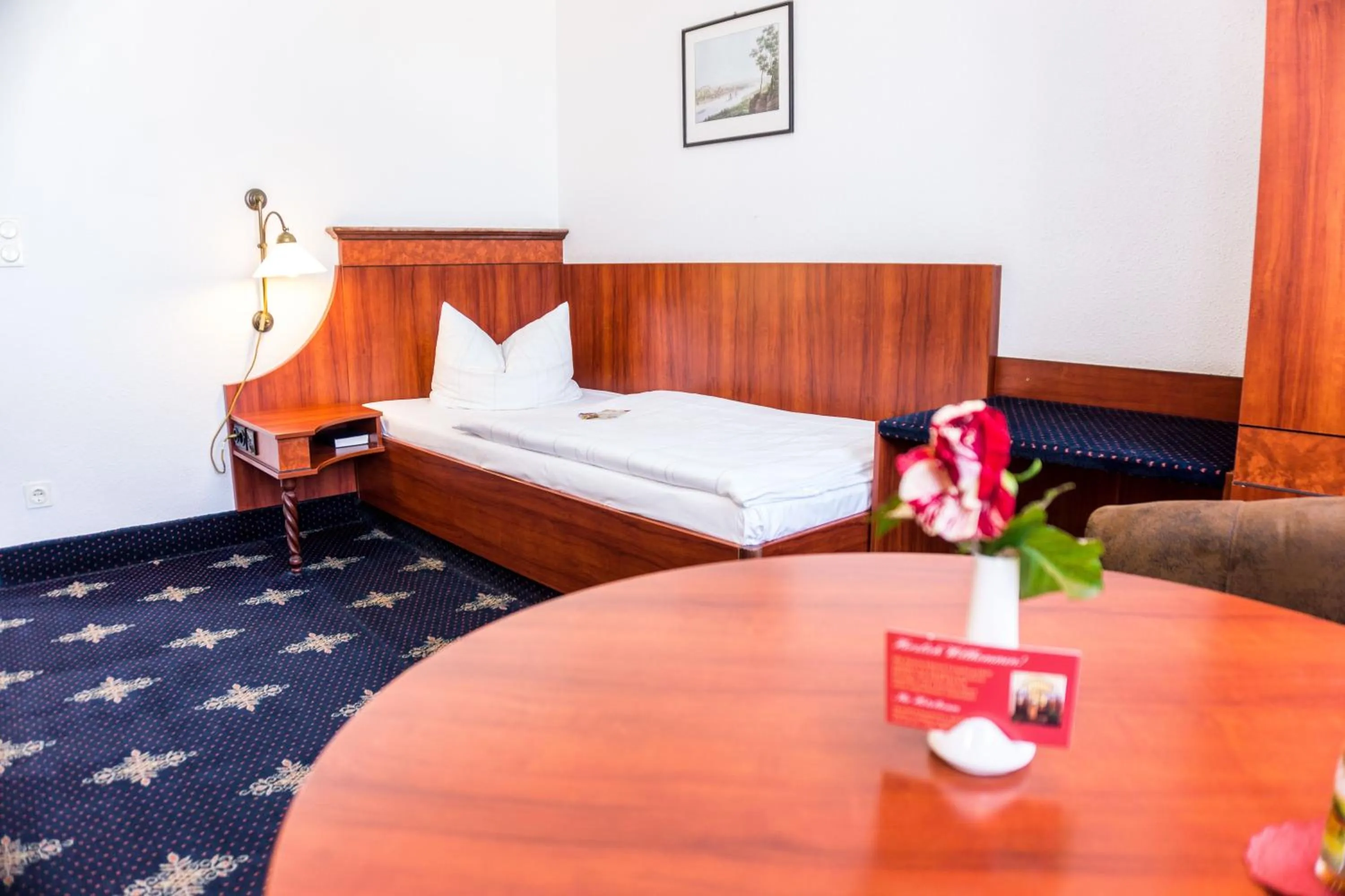 Photo of the whole room, Bed in Hotel Wilder Mann Annaberg-Buchholz