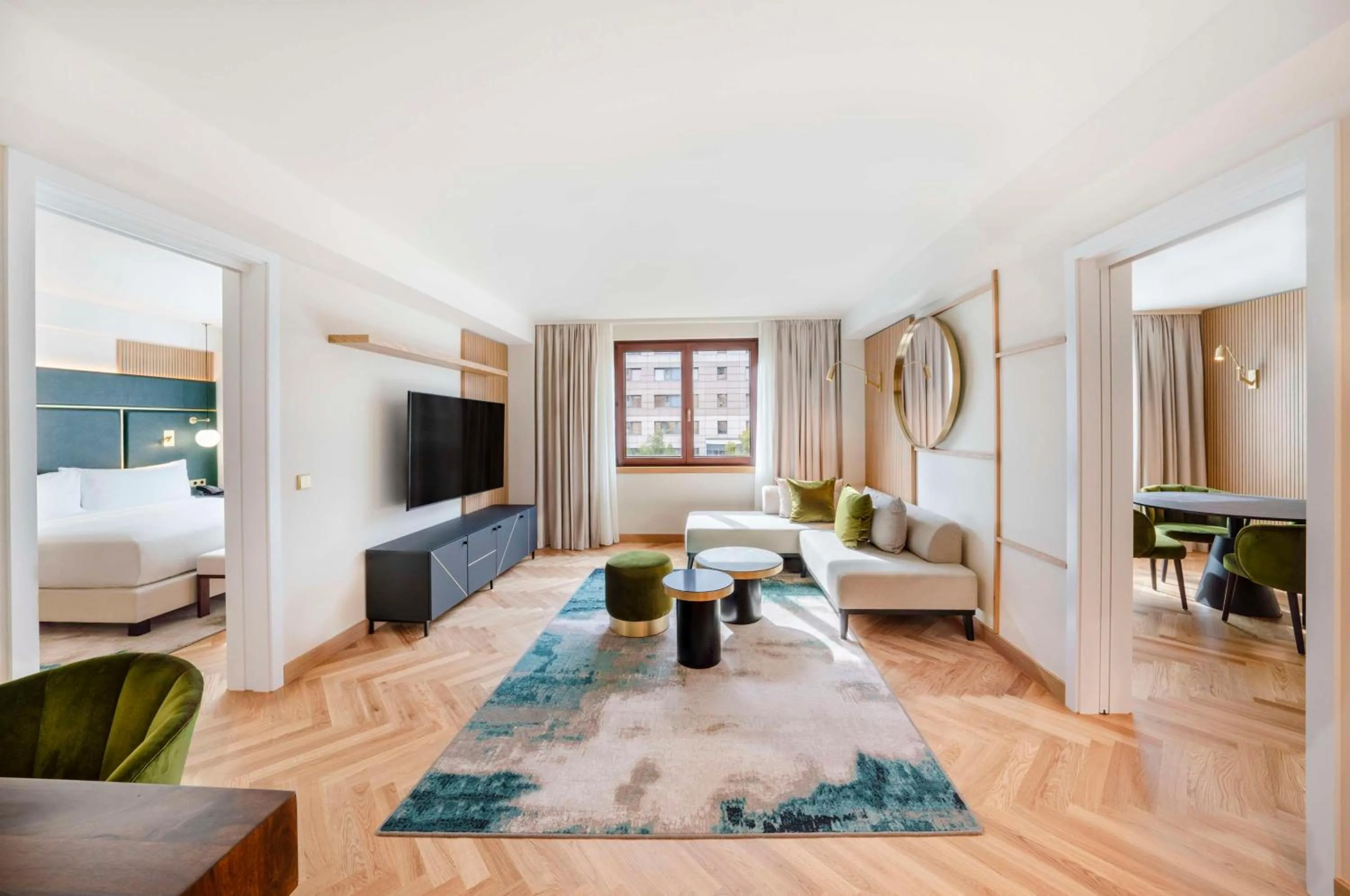 Living room, Bed in Hilton Berlin