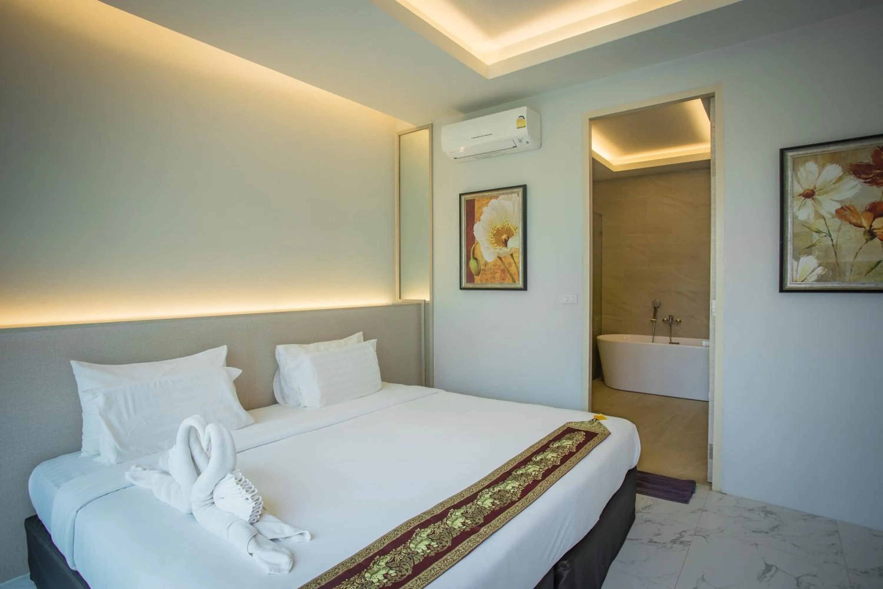 Bed in Gold Chariot Pool Villa, Phuket - SHA Plus Certified