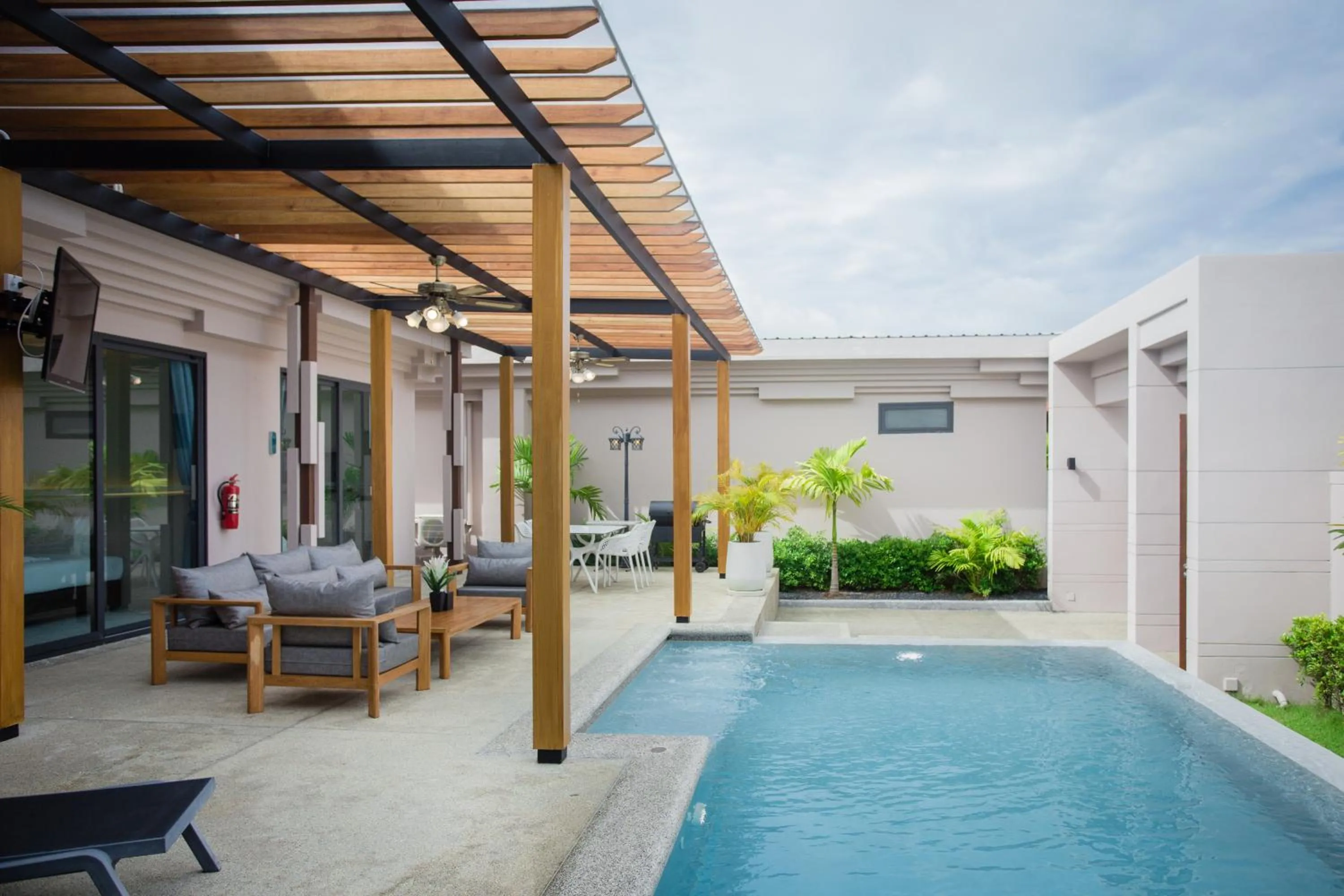 Swimming pool in Gold Chariot Pool Villa, Phuket - SHA Plus Certified