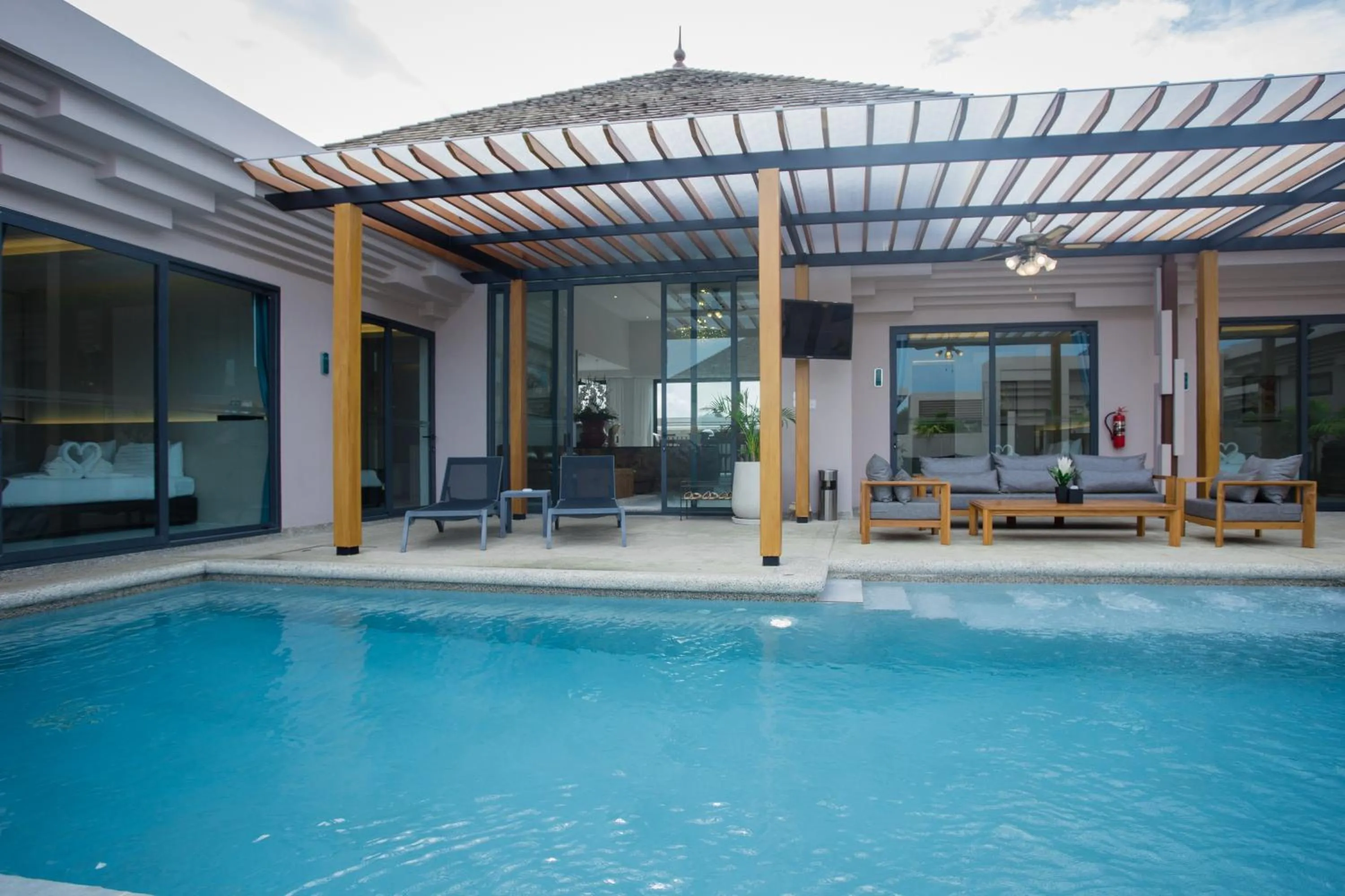 Swimming pool in Gold Chariot Pool Villa, Phuket - SHA Plus Certified