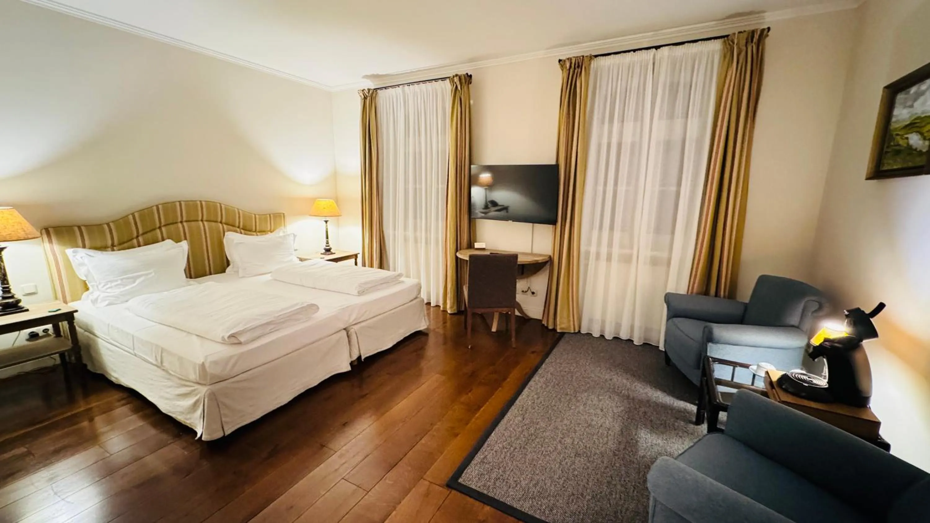 Photo of the whole room, Bed in Golfhotel Schloss Lüdersburg Golf & Spa