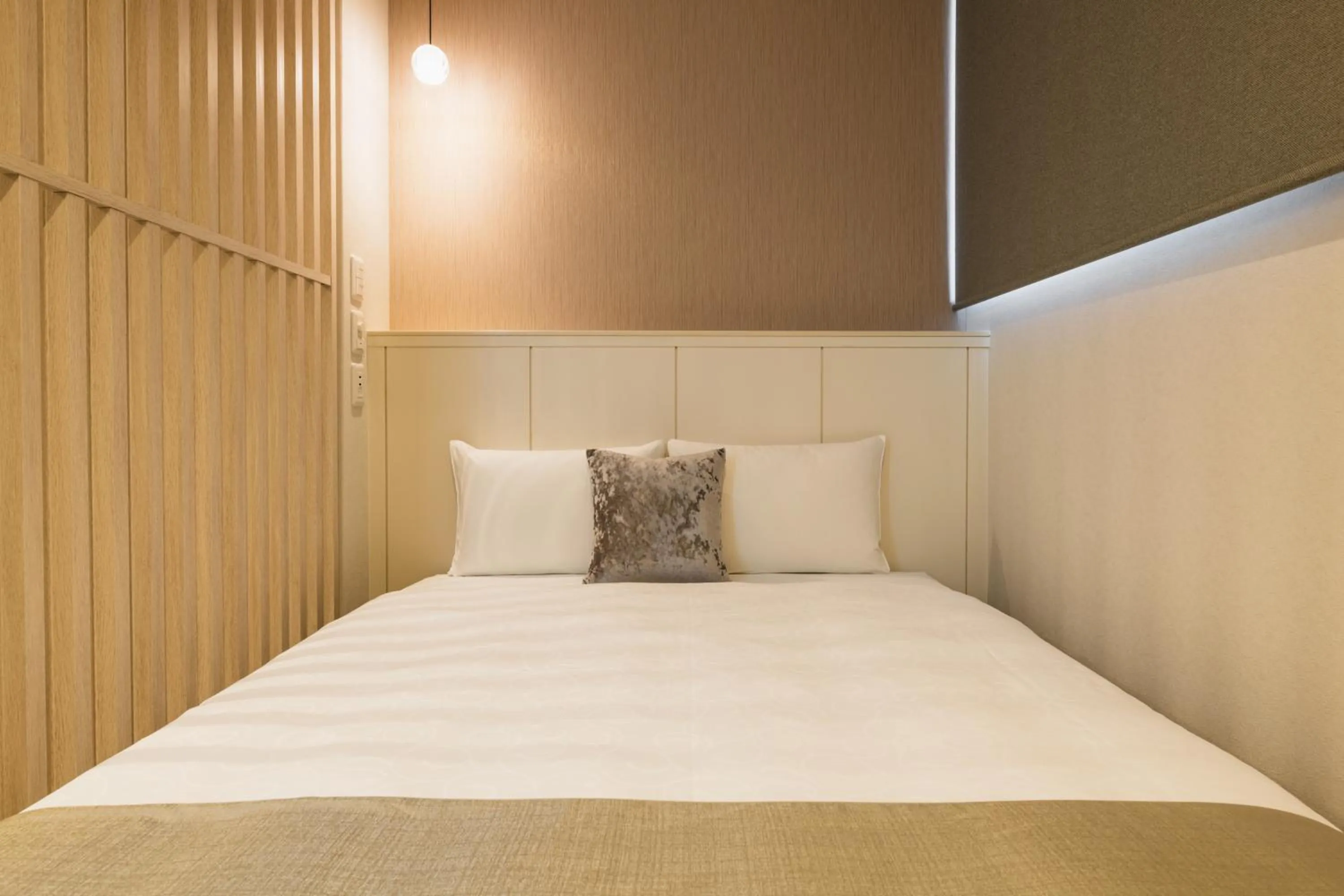 Bed in GRAND BASE Yakuin Odori