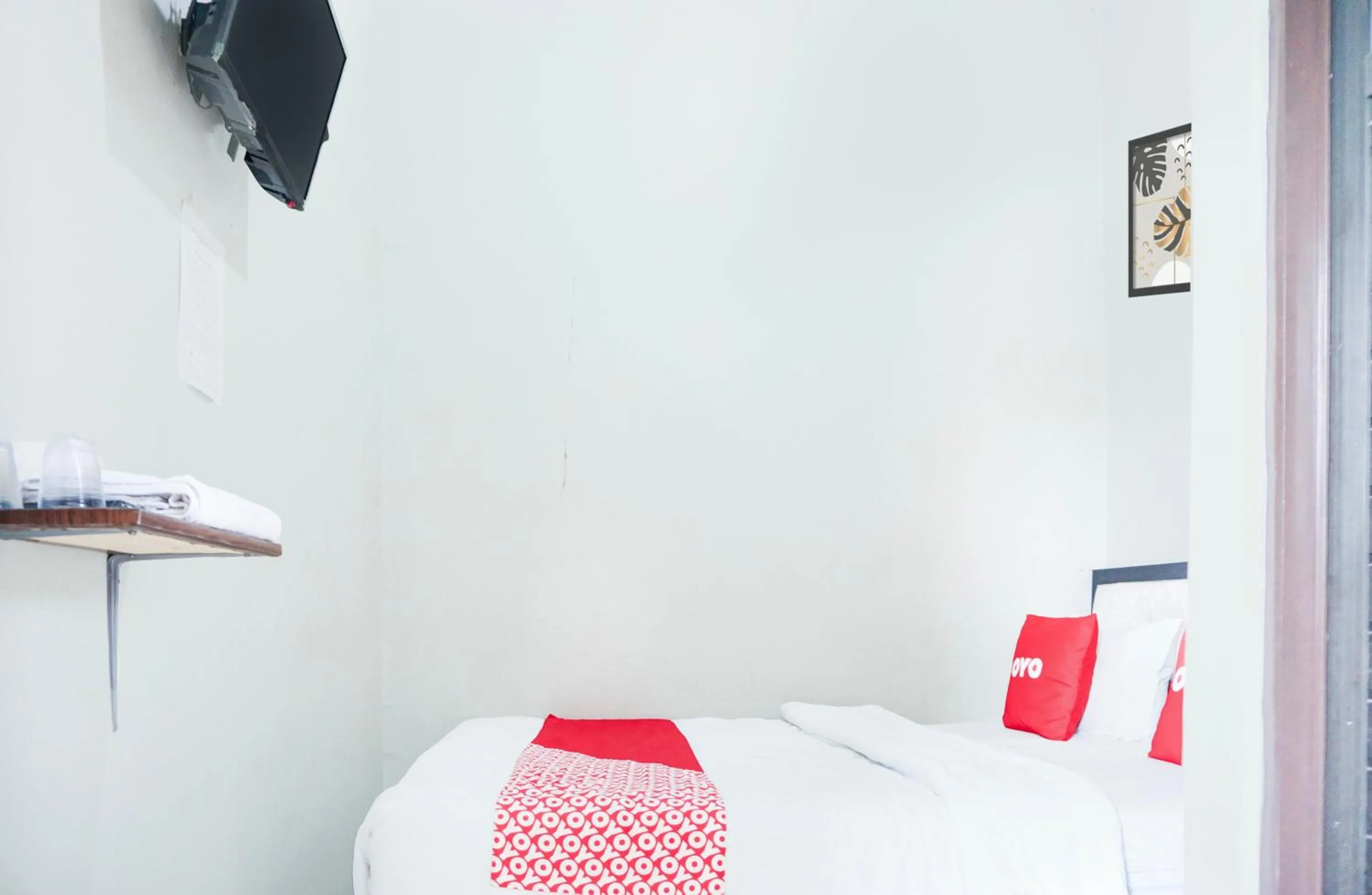 Bedroom in Hotel O Sukarame Near Universitas Islam Negeri Raden Intan Lampun Formerly Hotel Wisma Tri Handayani