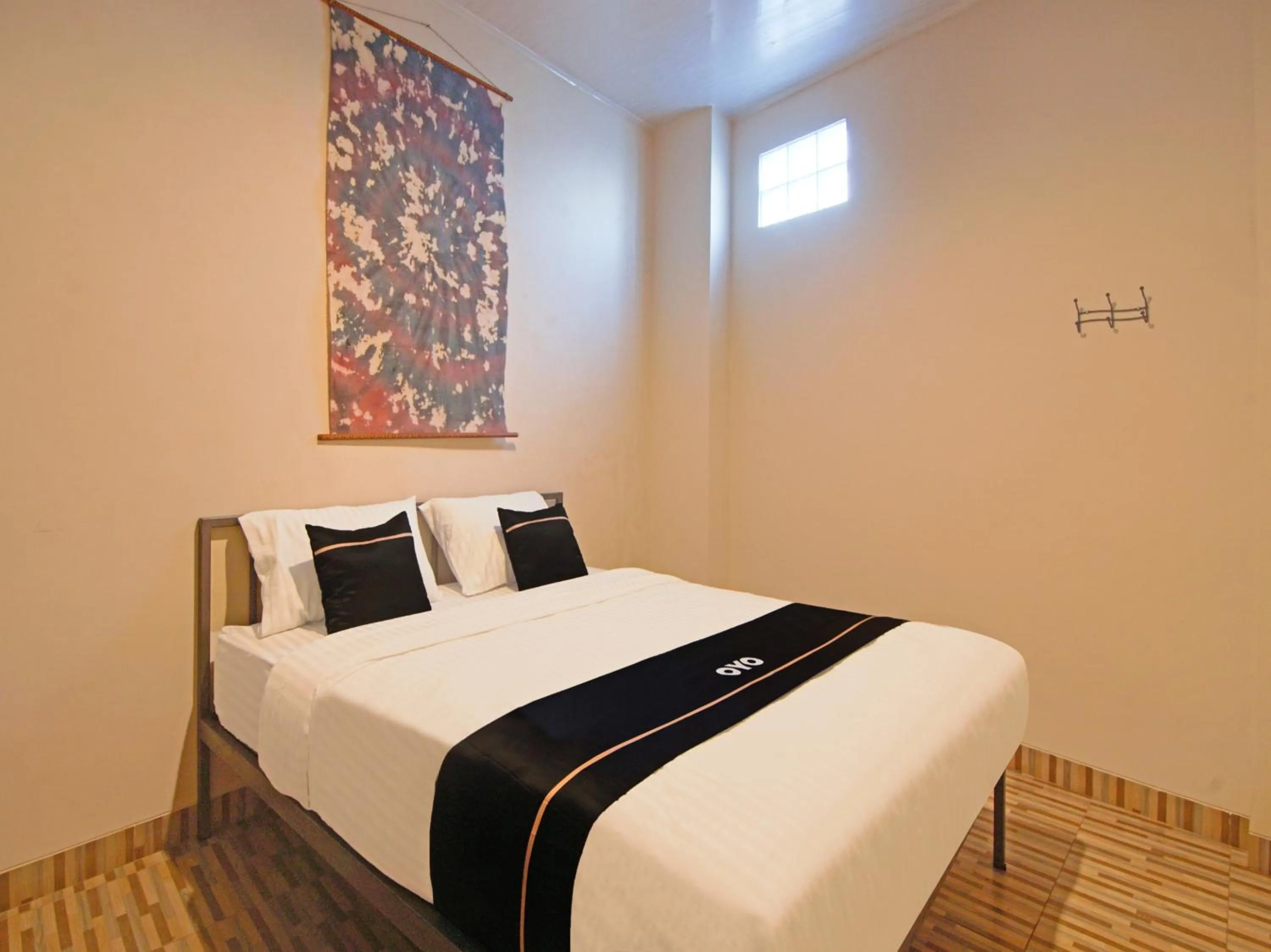 Bedroom in OYO 3606 Cendrawasih Resident