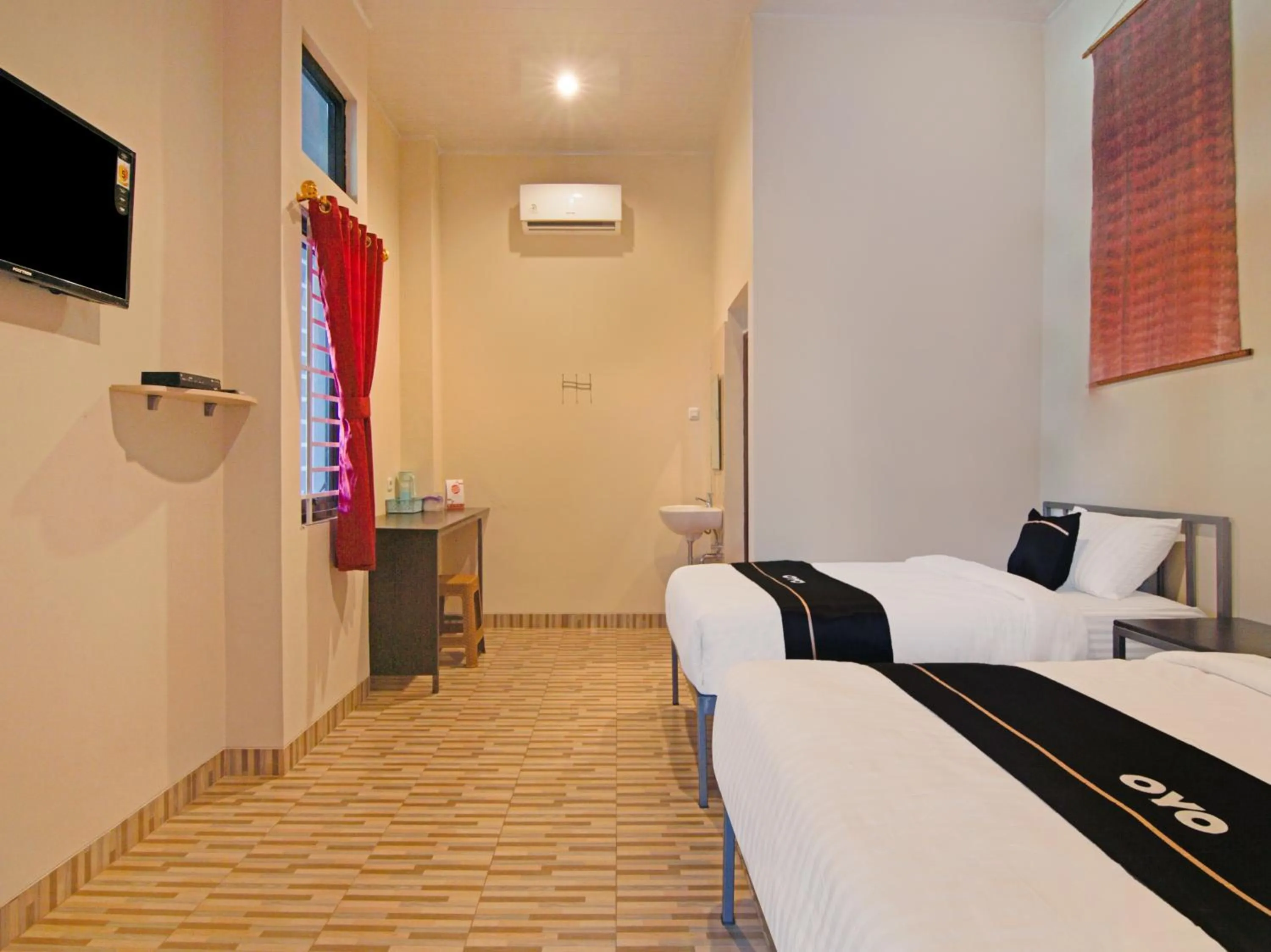 Bedroom in OYO 3606 Cendrawasih Resident