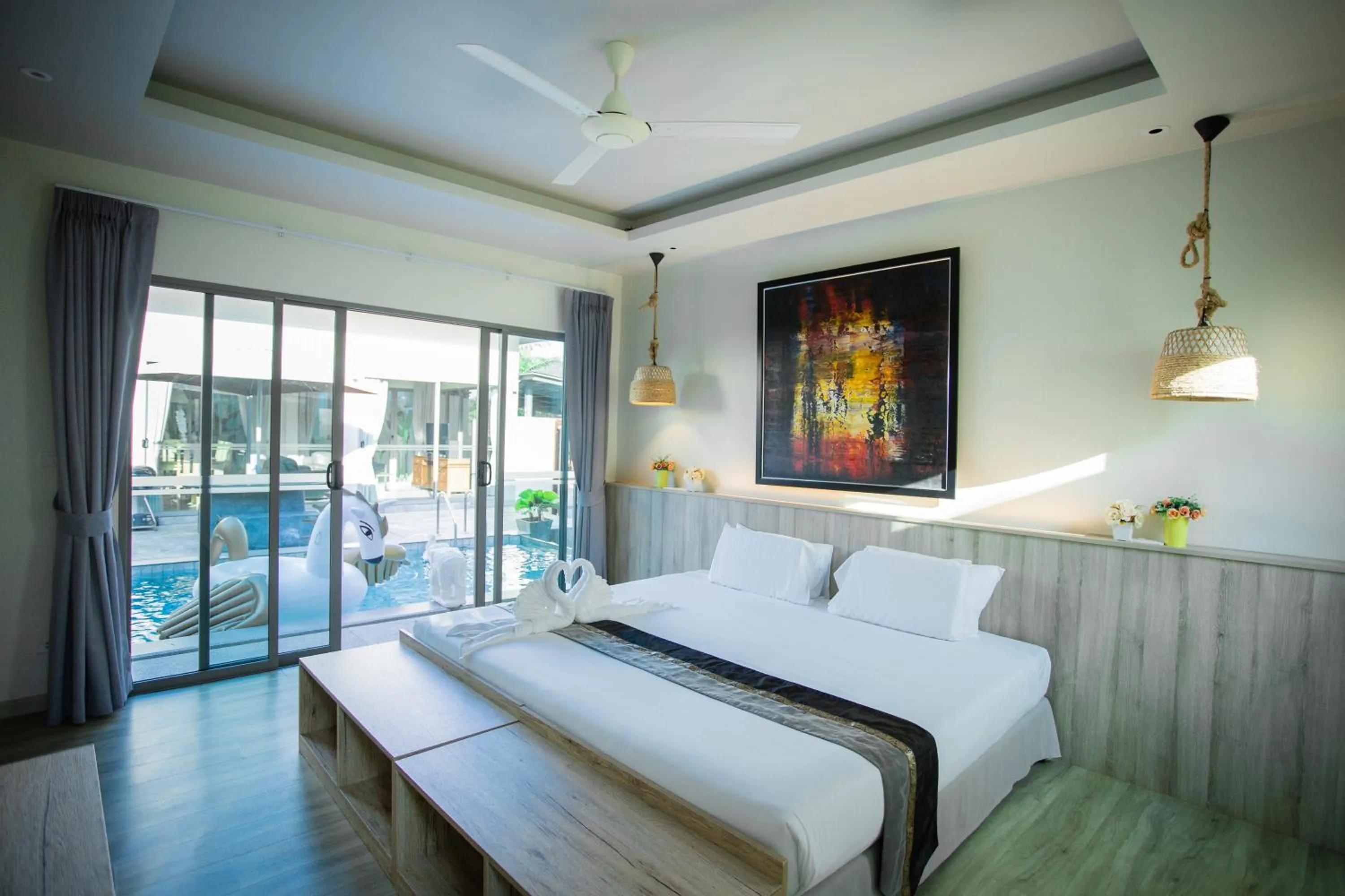 Bed in Yipmunta Pool Villa - SHA Plus Certified