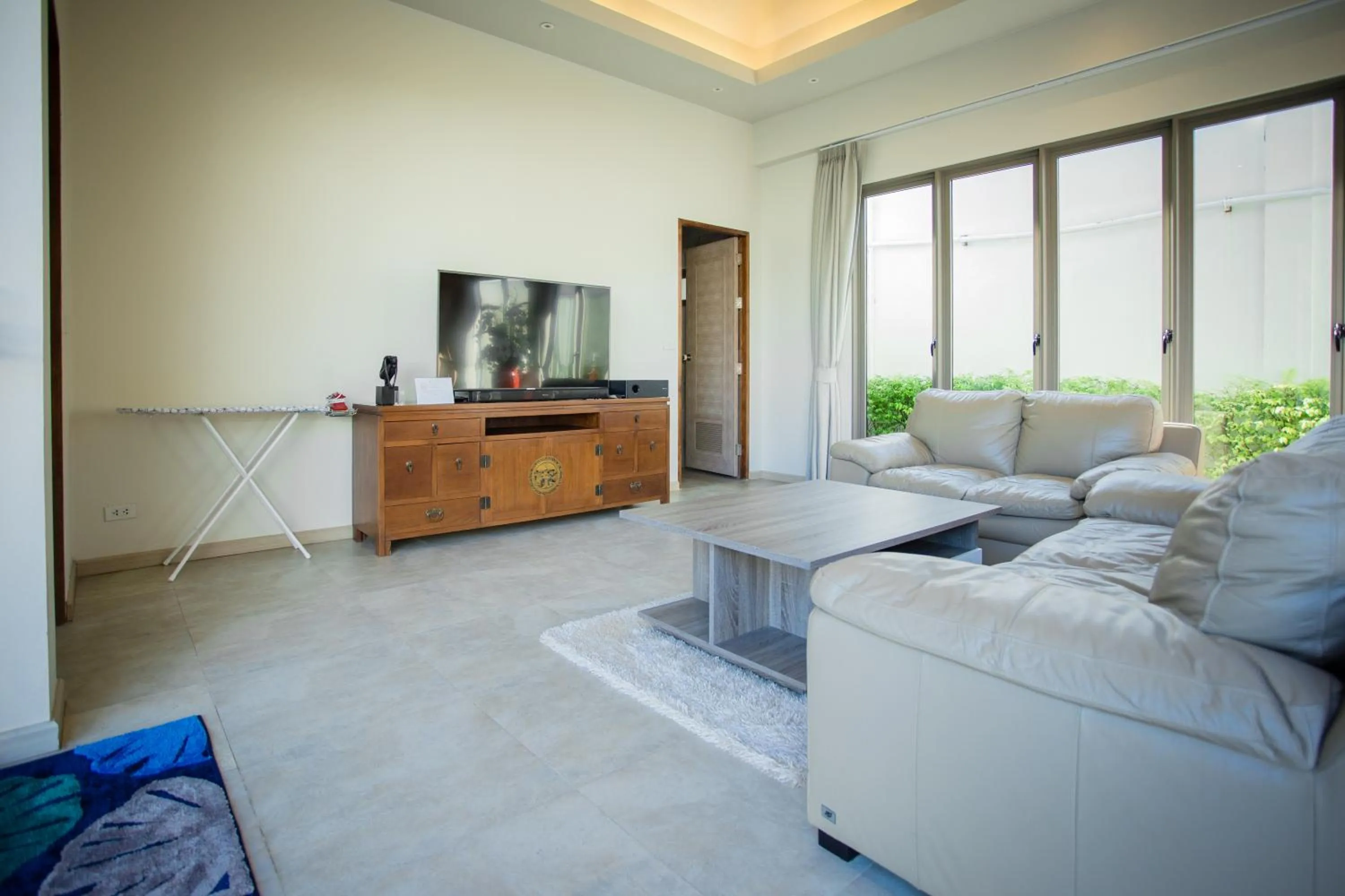 Living room in Yipmunta Pool Villa - SHA Plus Certified